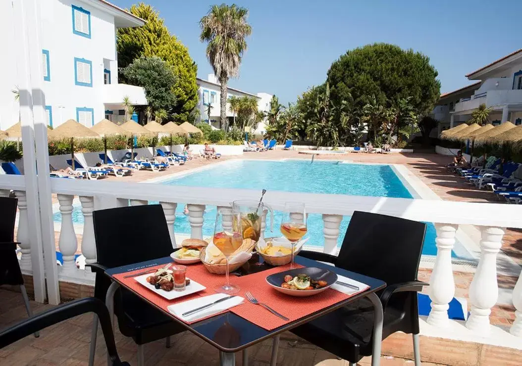 Swimming pool in Agua Hotels Vila Branca