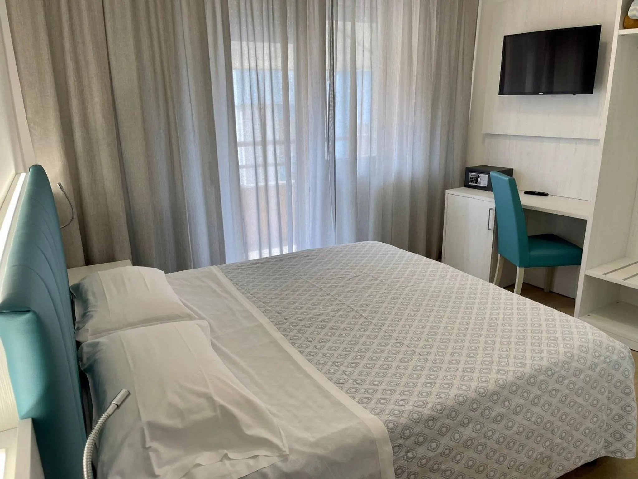 Bed in Hotel Corallo