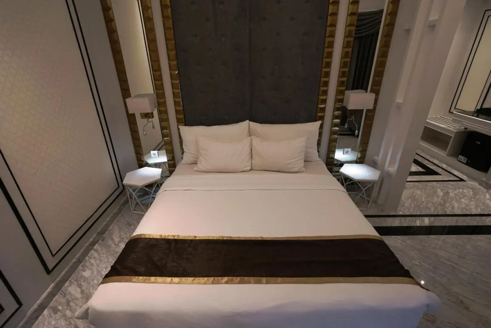 Bed in The Grantage Hotel & Sky Lounge