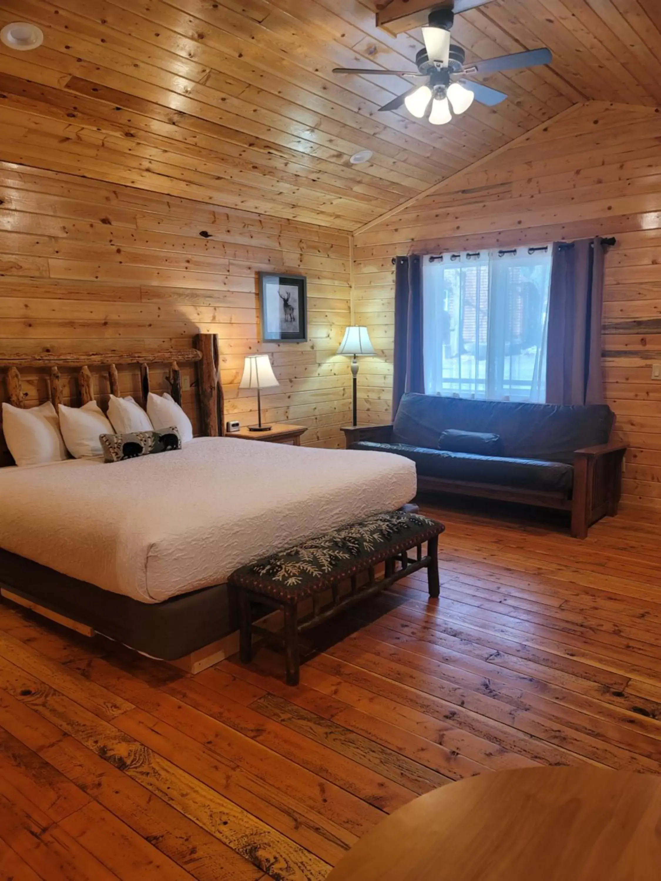 Photo of the whole room, Bed in Riverfront Motel & Cabins