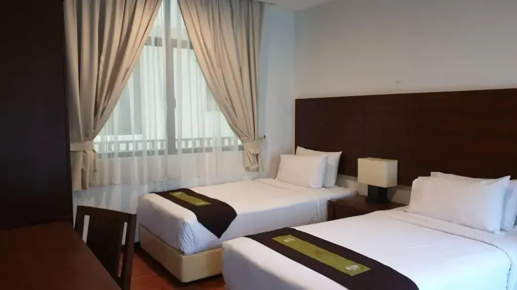 Bed in Samsuria Beach Resort & Residence