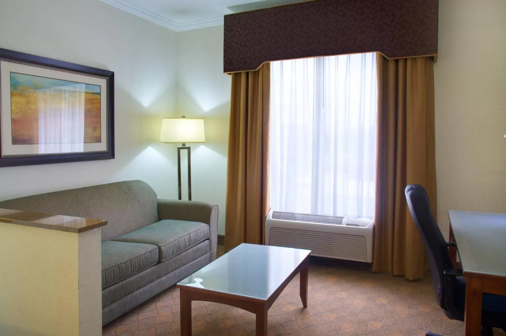 Bedroom, Seating Area in Holiday Inn Express Hotel & Suites Lufkin South, an IHG Hotel