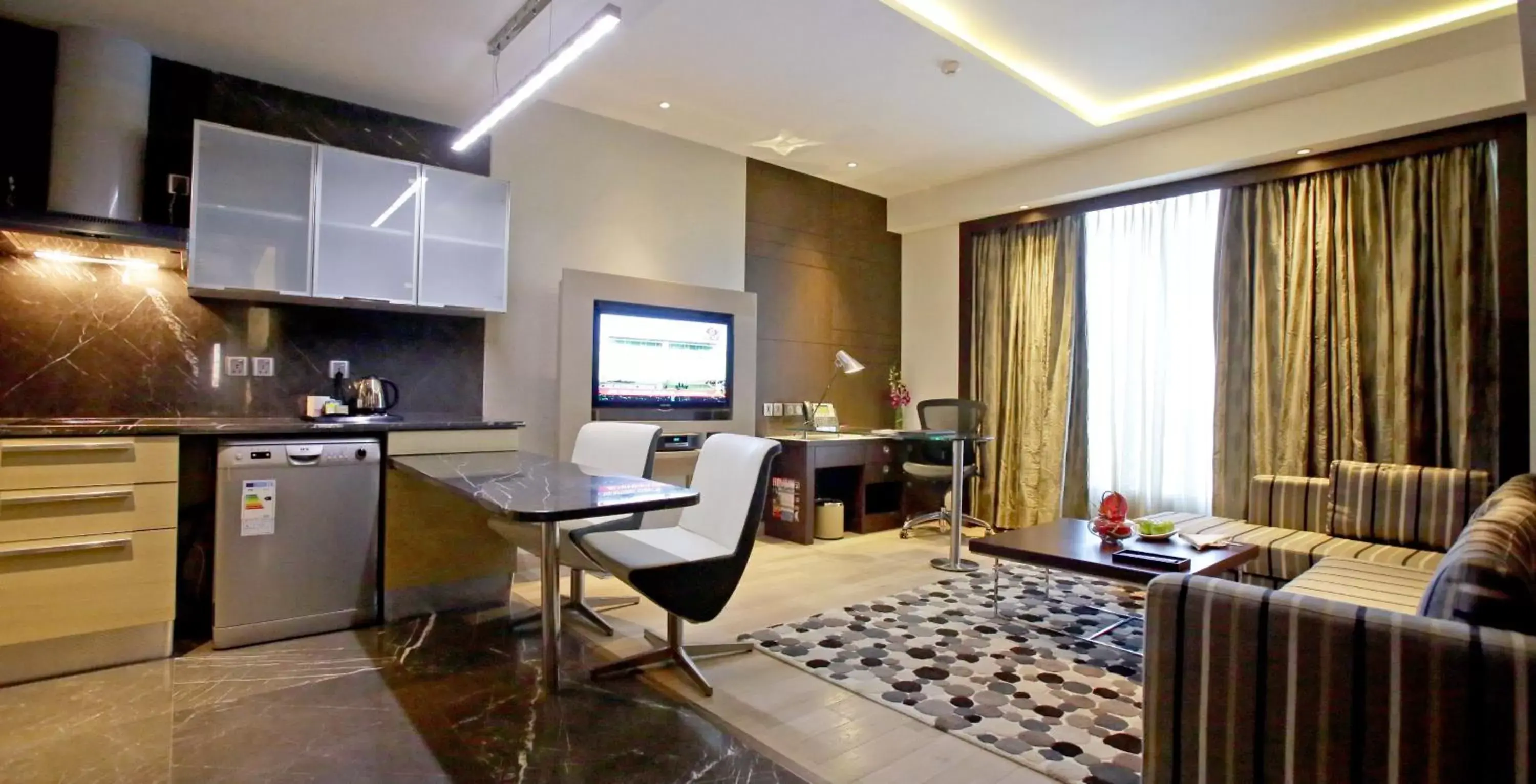 TV and multimedia in Crowne Plaza Greater Noida, an IHG Hotel