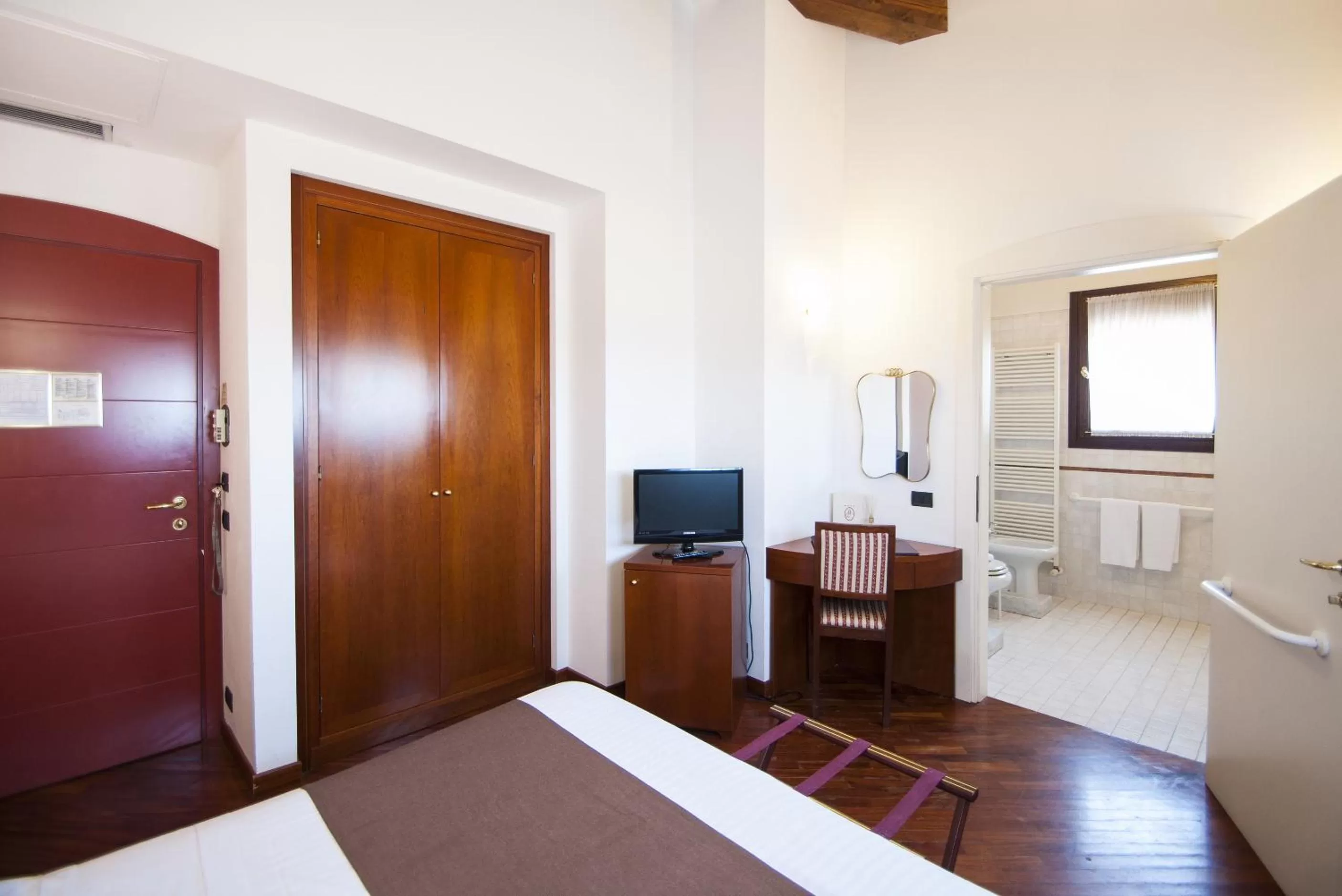 Photo of the whole room, Bed in Alla Rocca Hotel Conference & Restaurant