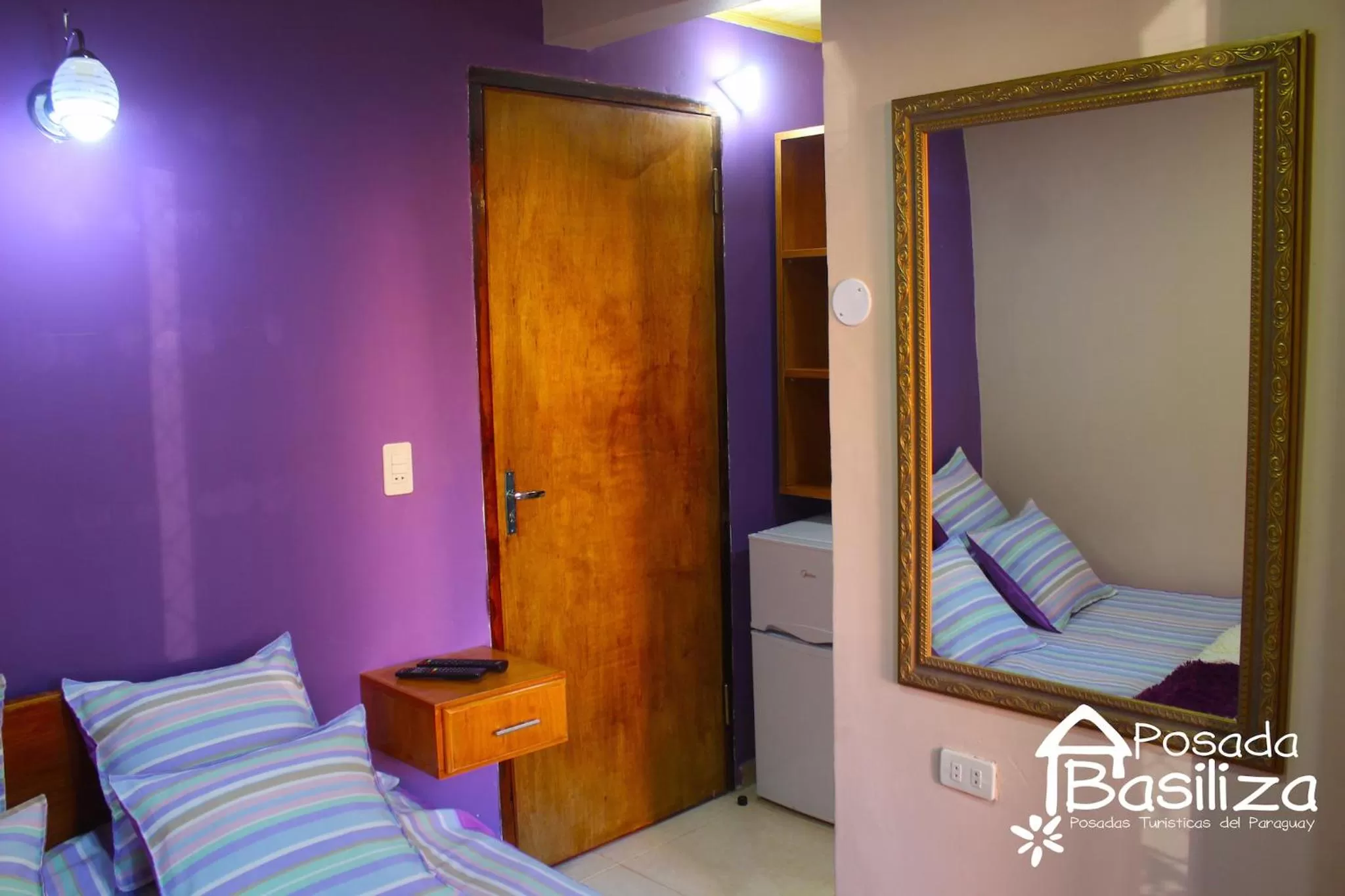 Photo of the whole room, Bed in Posada Basiliza, Encarnación PY