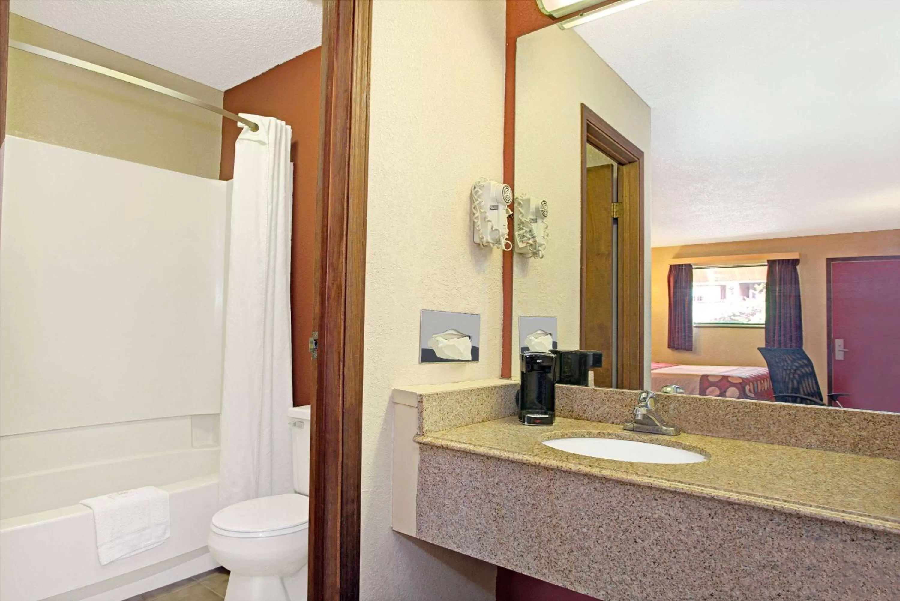 Photo of the whole room in Super 8 by Wyndham Cincinnati-Springdale OH