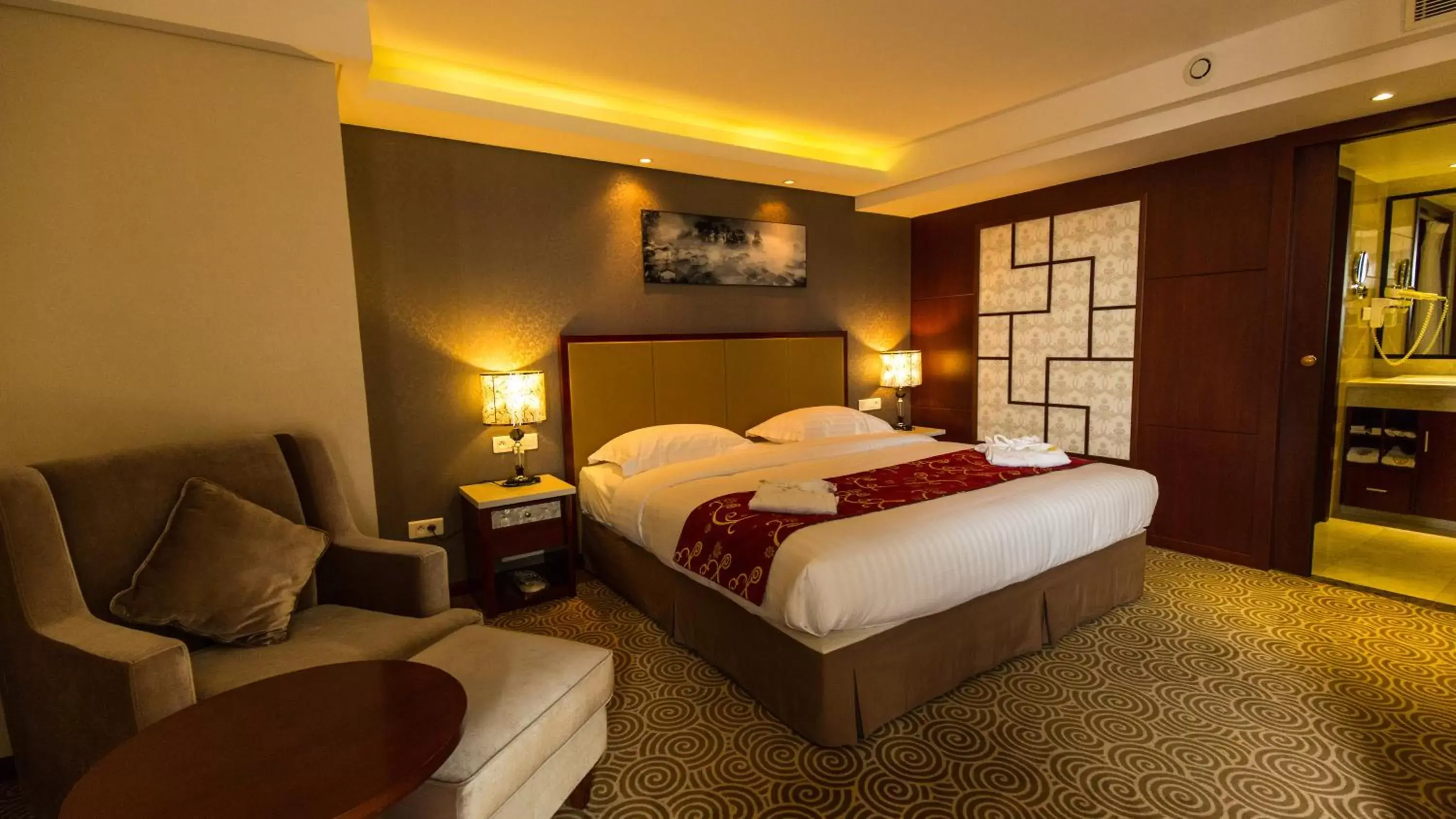 Bedroom in Hôtel Huatian Chinagora