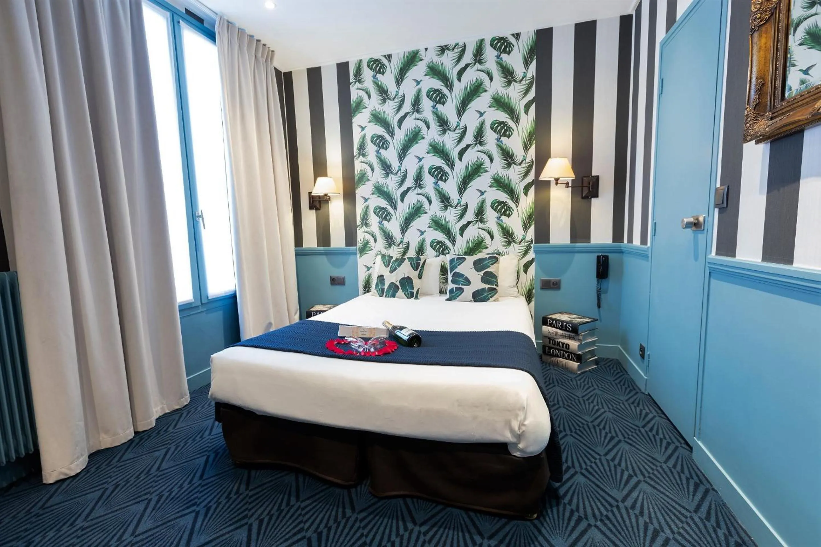 Bed in Hôtel du Théâtre by Patrick Hayat