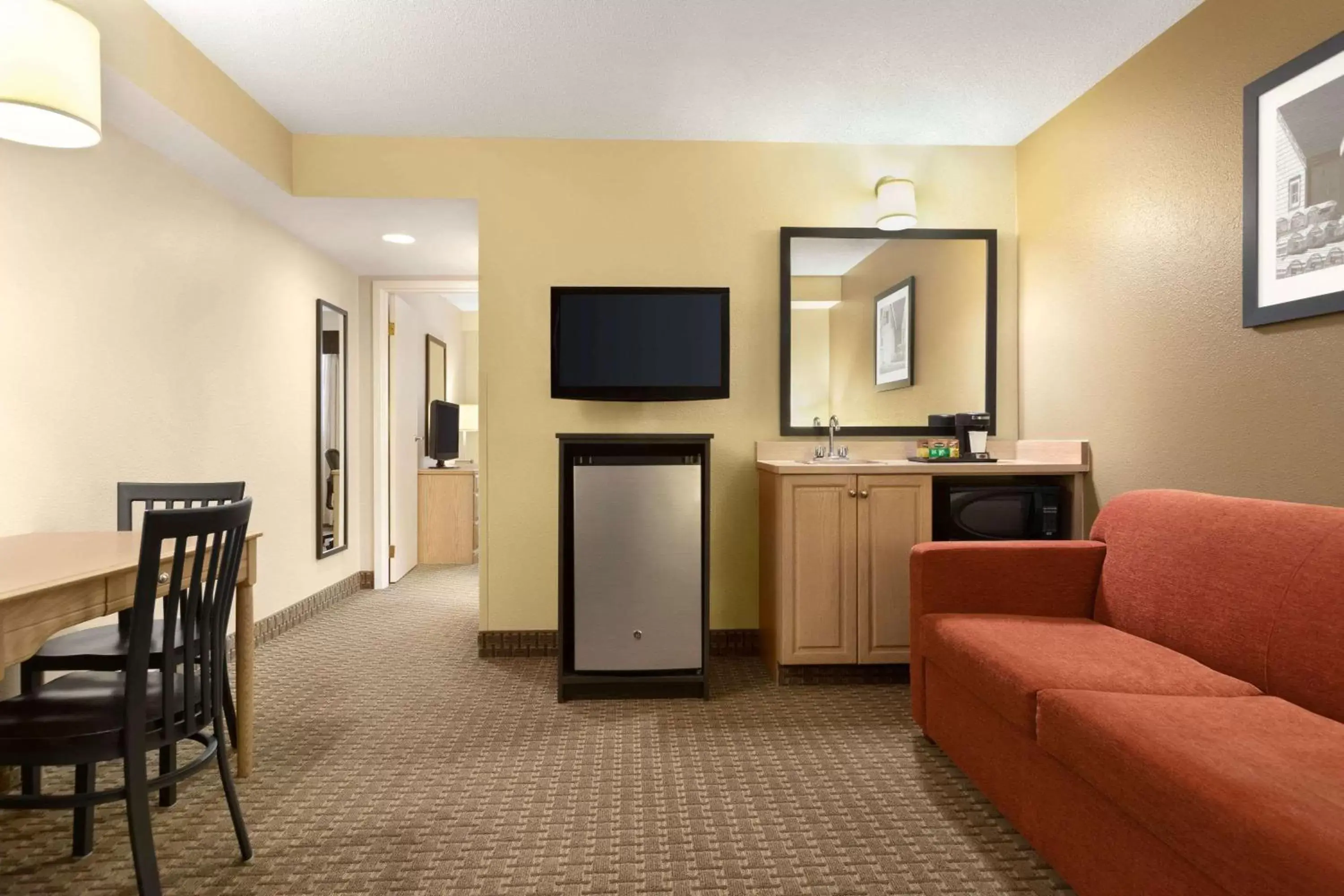 Photo of the whole room, TV/Entertainment Center in Travelodge Suites by Wyndham Moncton