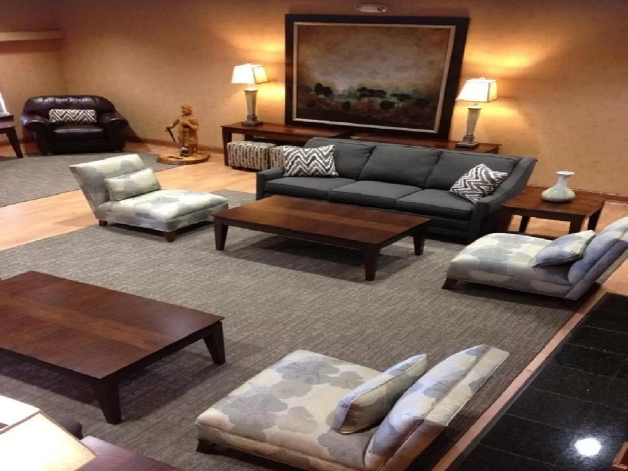 Communal lounge/ TV room, Seating Area in Town & Country Inn and Suites