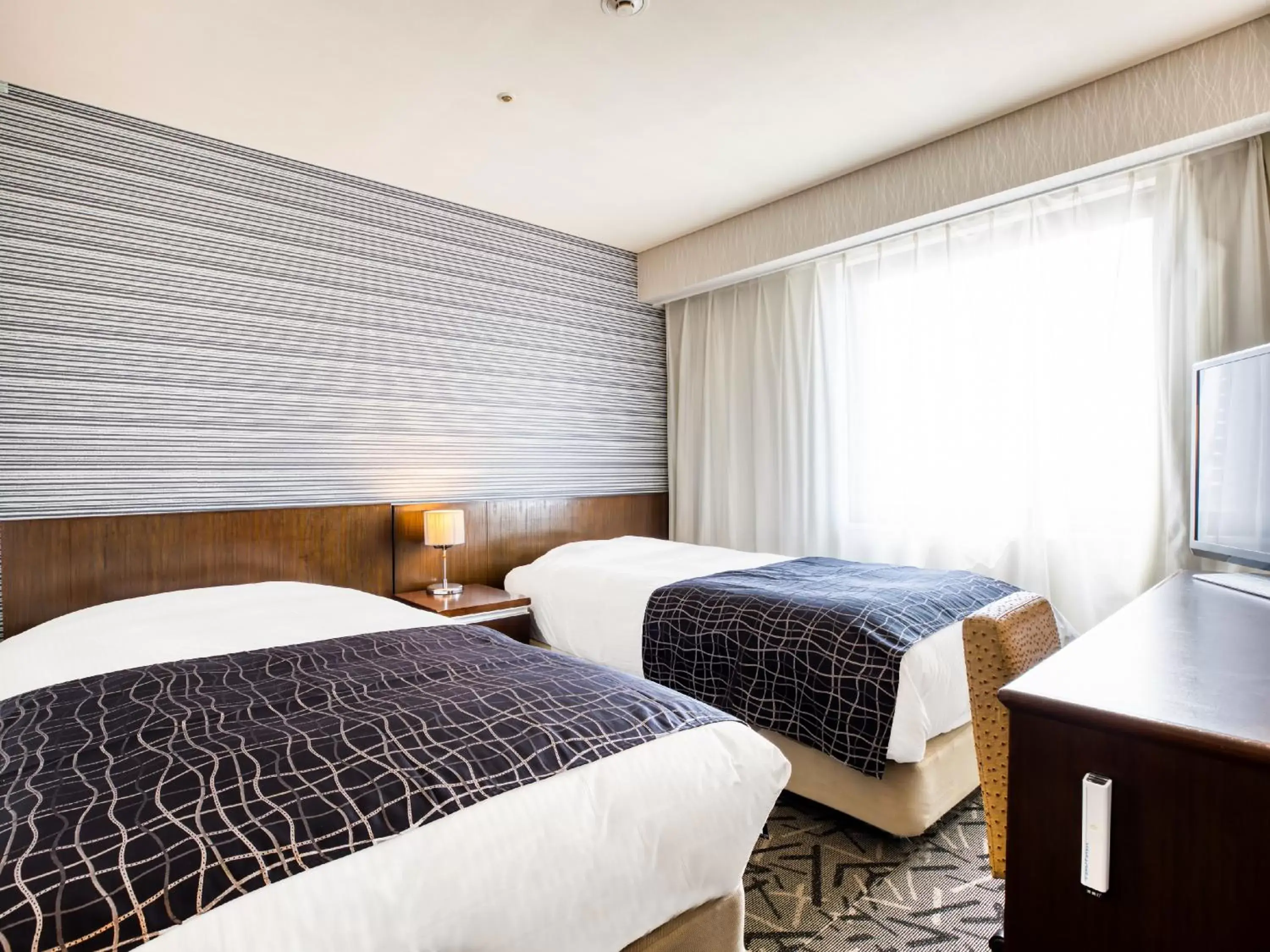 Bed in APA Hotel Matsuyamajo-Nishi