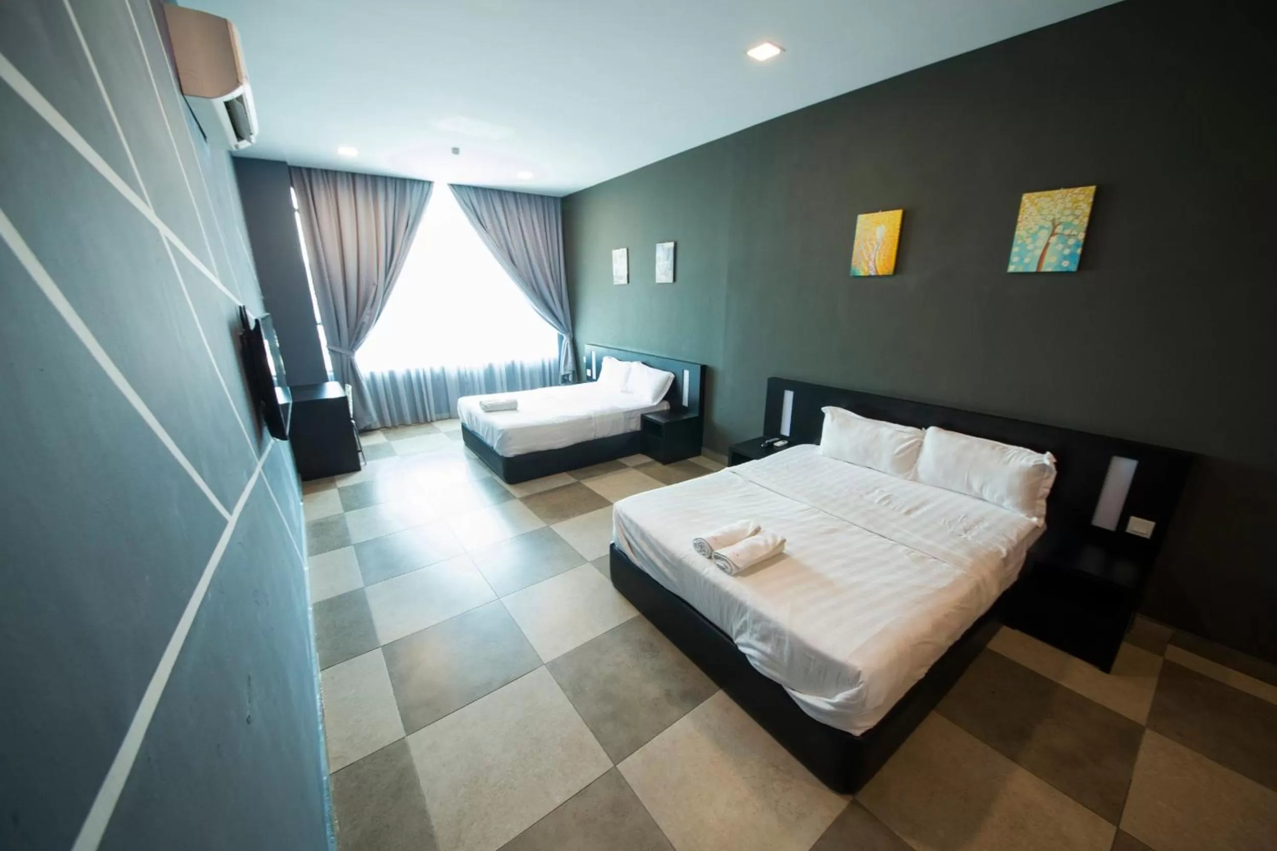 Deluxe Family Room in Elite Hotel