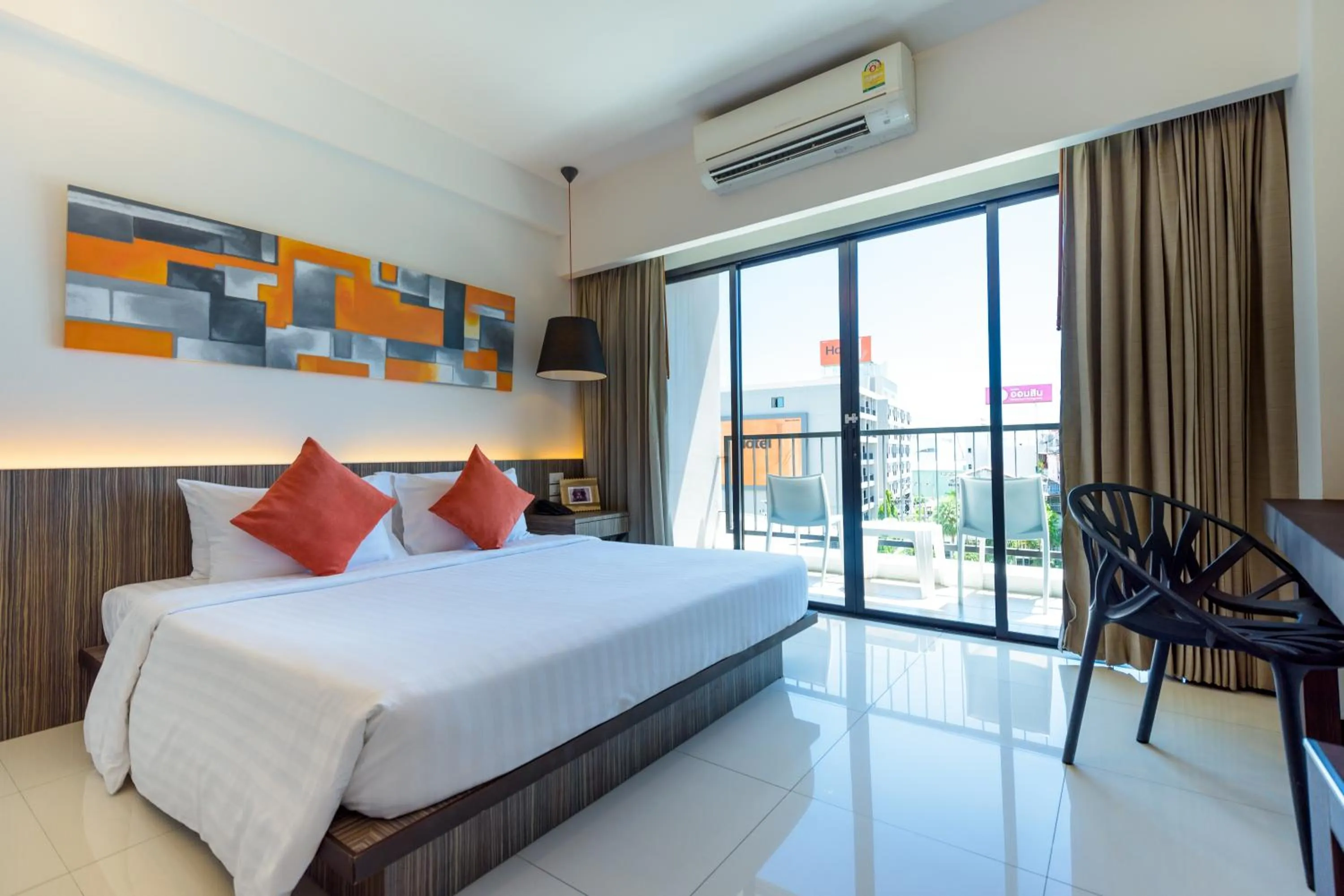 Bed in Hotel J Residence Pattaya