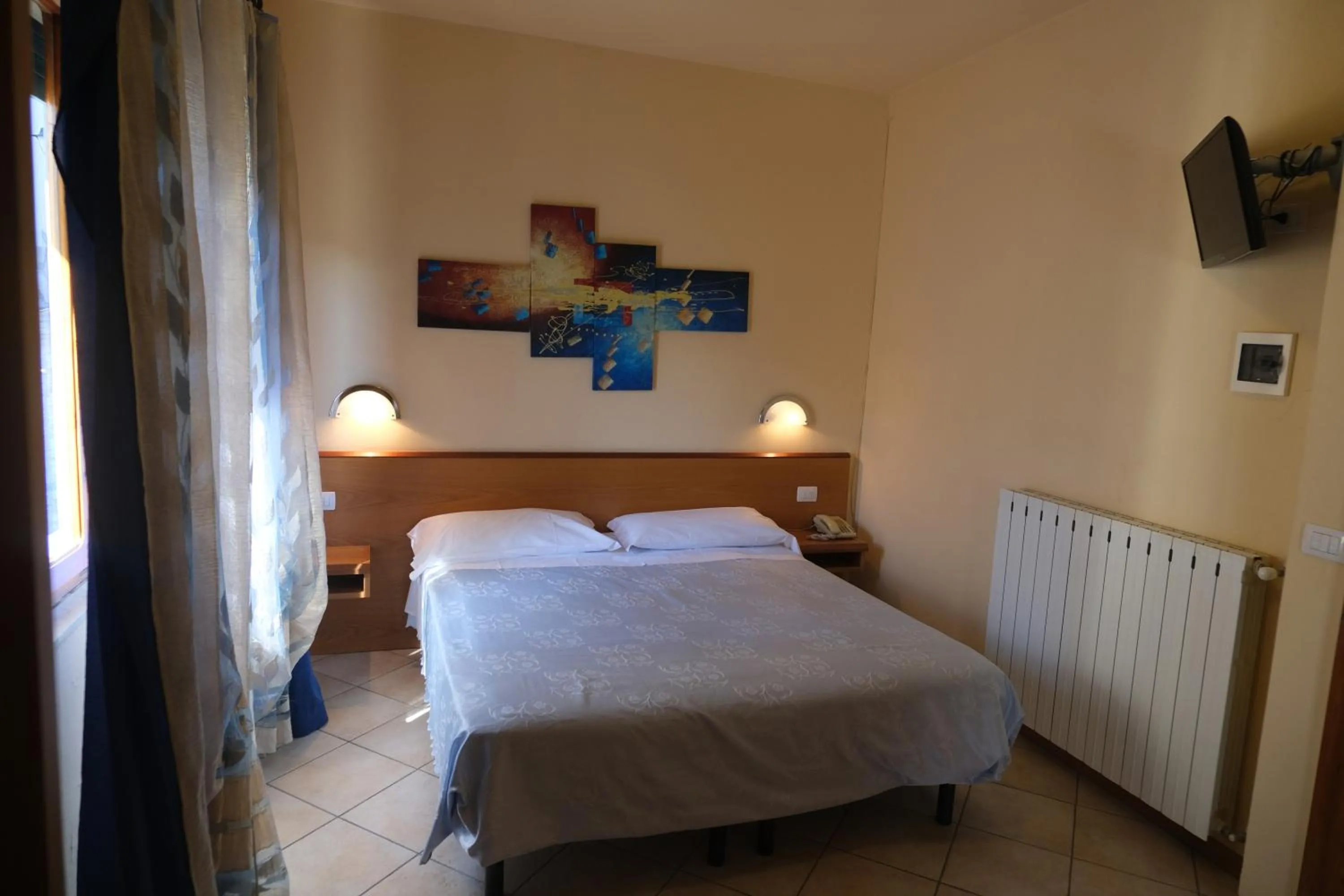 Bedroom, Bed in Amelia Hotel