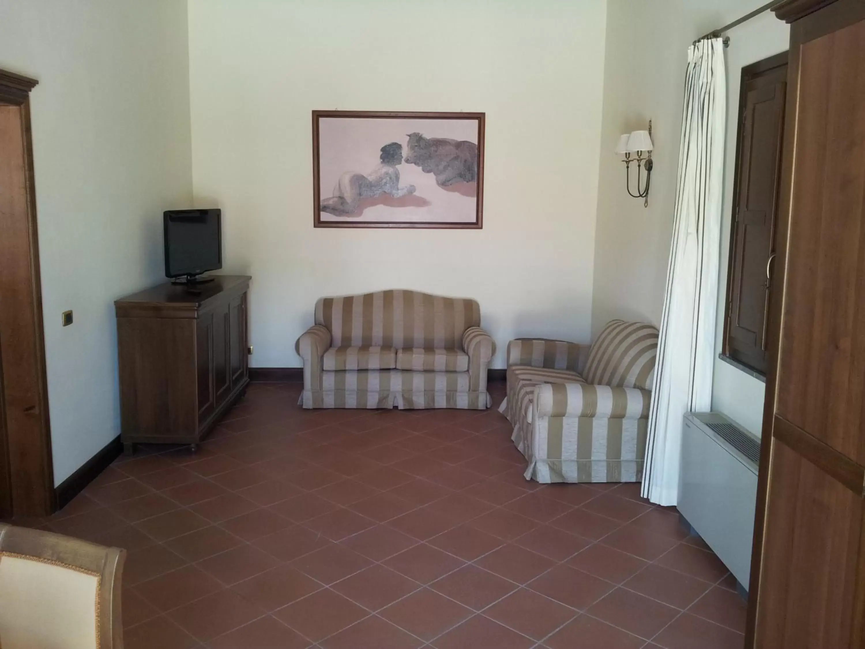 TV and multimedia, Seating Area in Hotel Villa Lampedusa