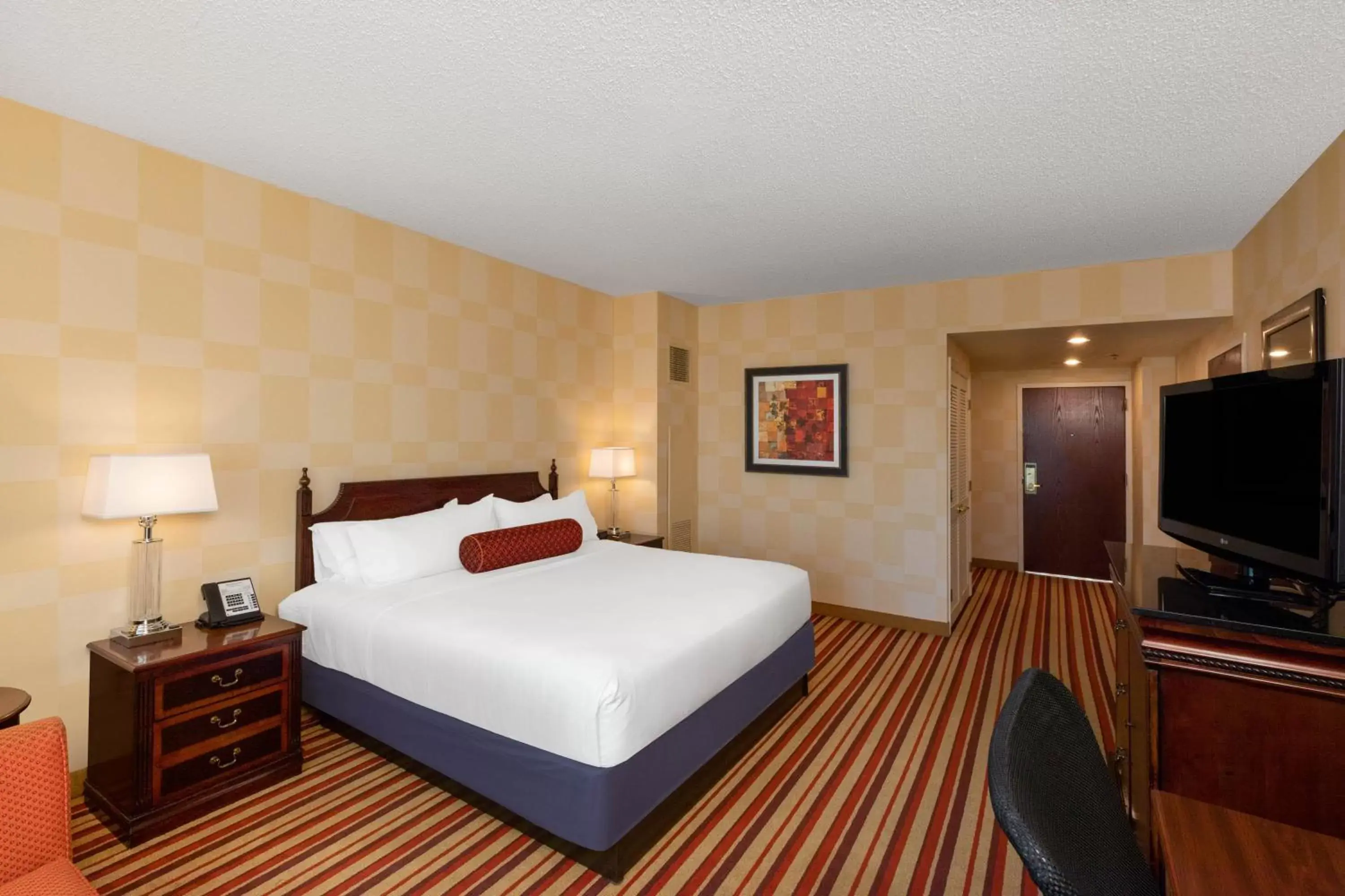 Bed in Wyndham Grand Oklahoma City Downtown