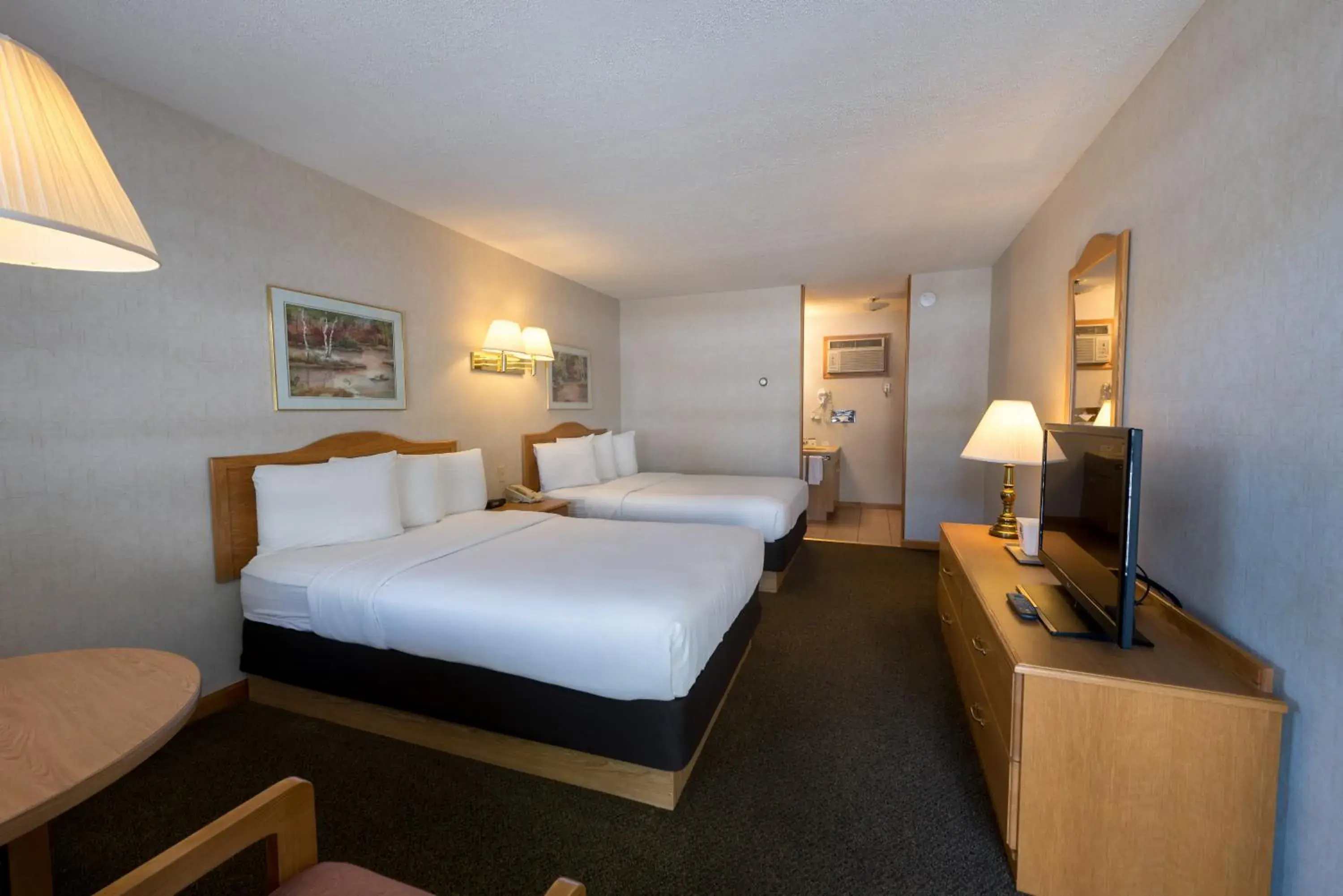 Bed in Americas Best Value Inn & Suites Lake George