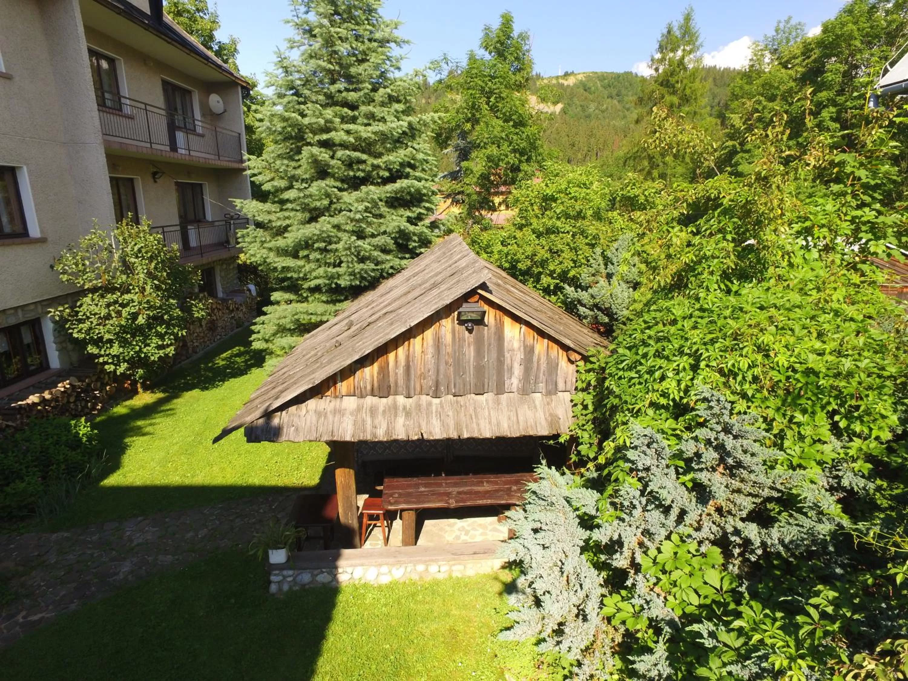 Garden in Gościniec i Herbaciarnia Pod Złotą Łyżwą