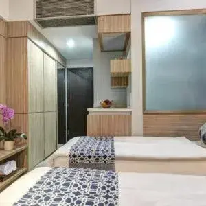 Bed in Sampit Residence managed by FLAT06