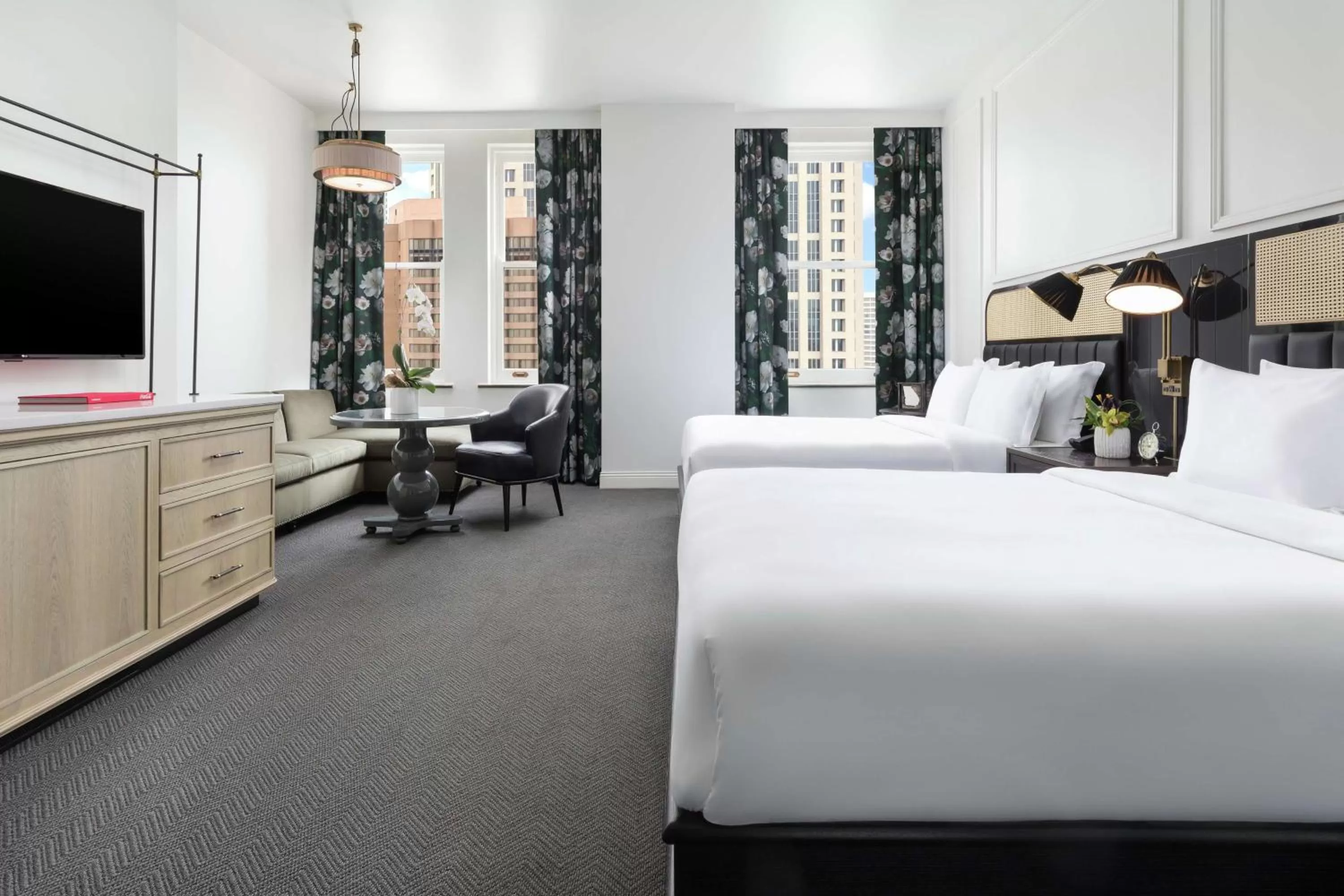 Living room, Bed in The Candler Hotel Atlanta, Curio Collection by Hilton