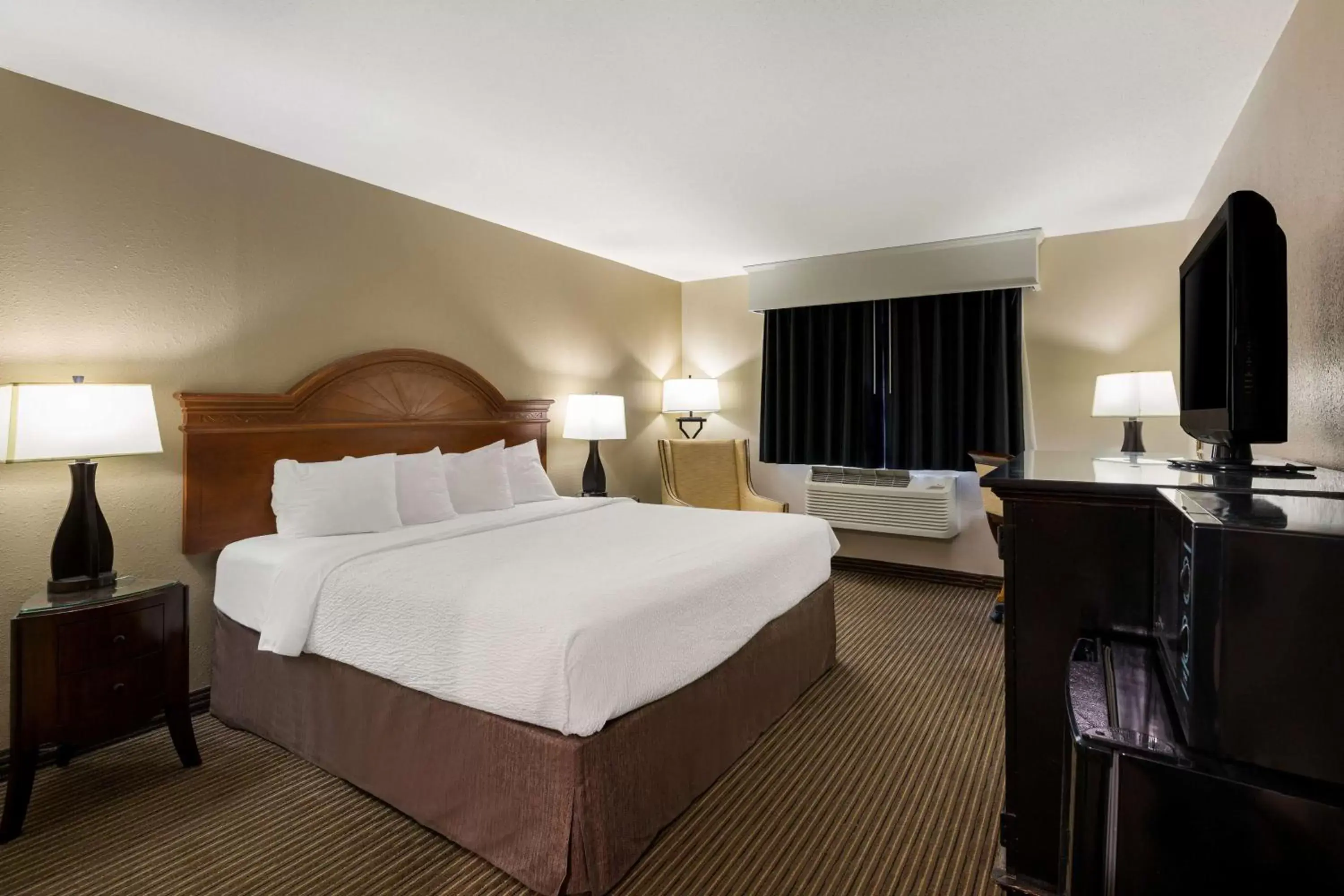 Bedroom, Bed in Revel Hotel Minot - SureStay Collection by Best Western