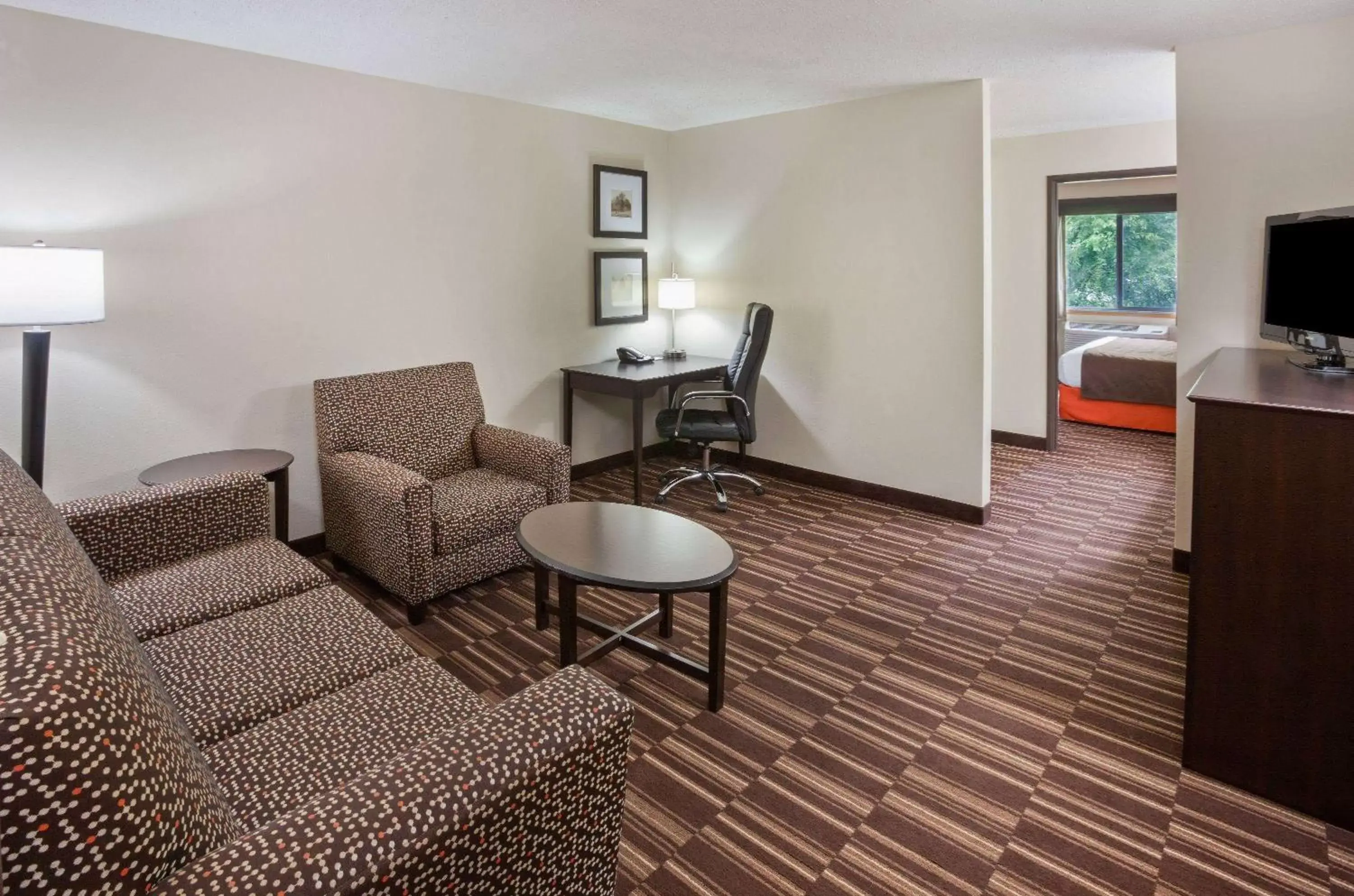Photo of the whole room, Seating Area in AmericInn by Wyndham Sartell