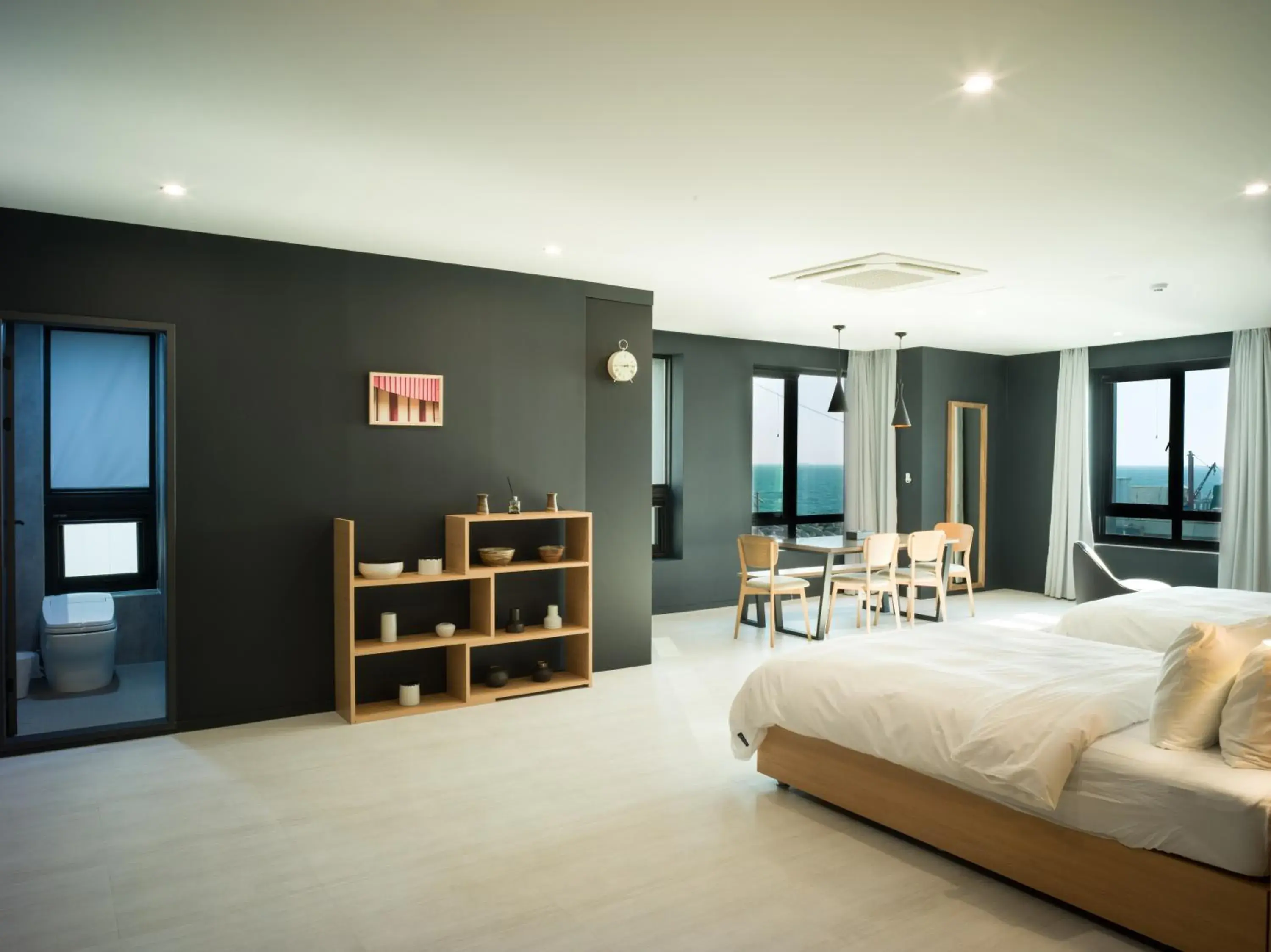 Bed in Mipo Oceanside Hotel Bed in Mipo Oceanside Hotel