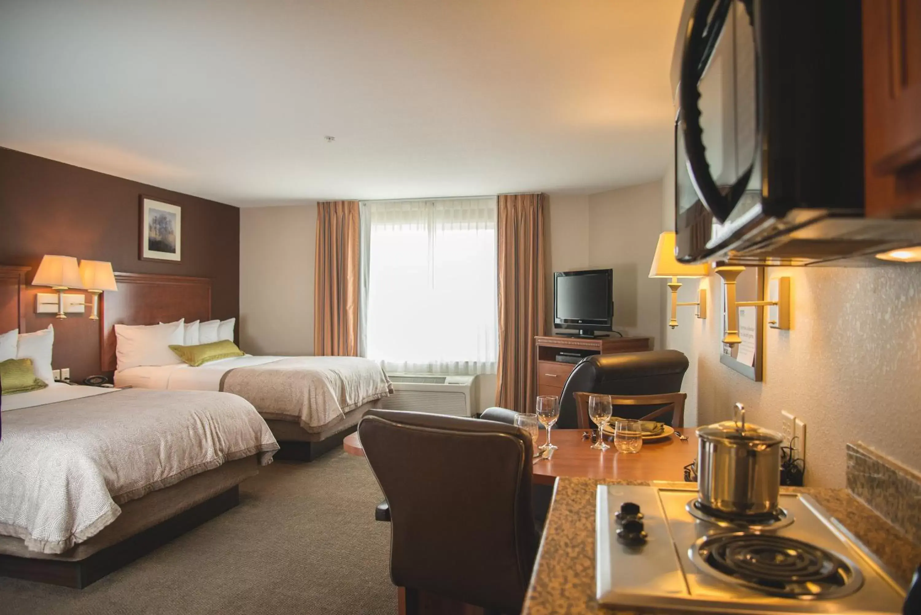 Bedroom in Candlewood Suites Loveland, an IHG Hotel