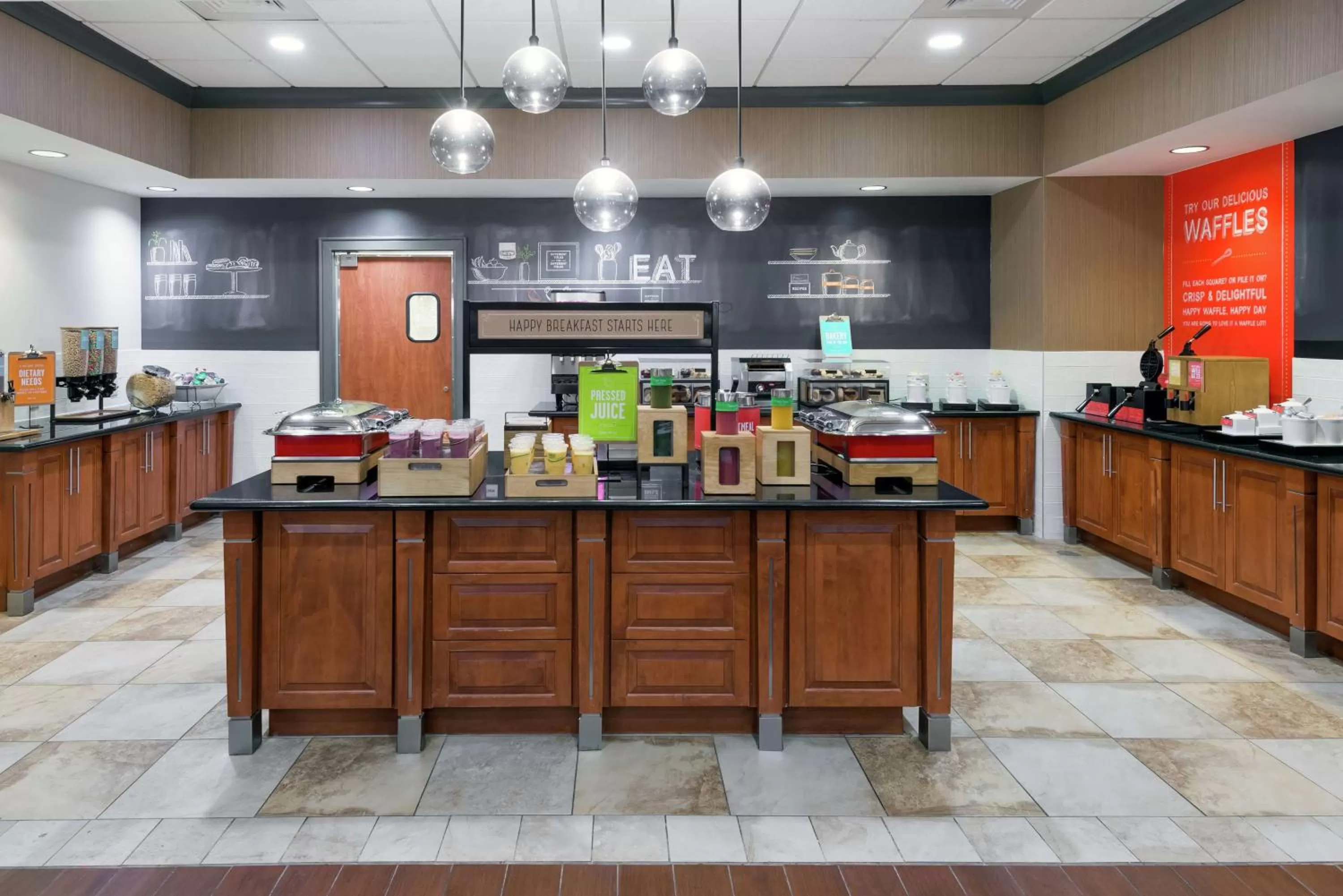 Breakfast in Hampton Inn & Suites Orlando Airport at Gateway Village