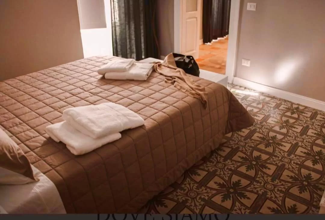 Bed in Il Campanile Premium B&b