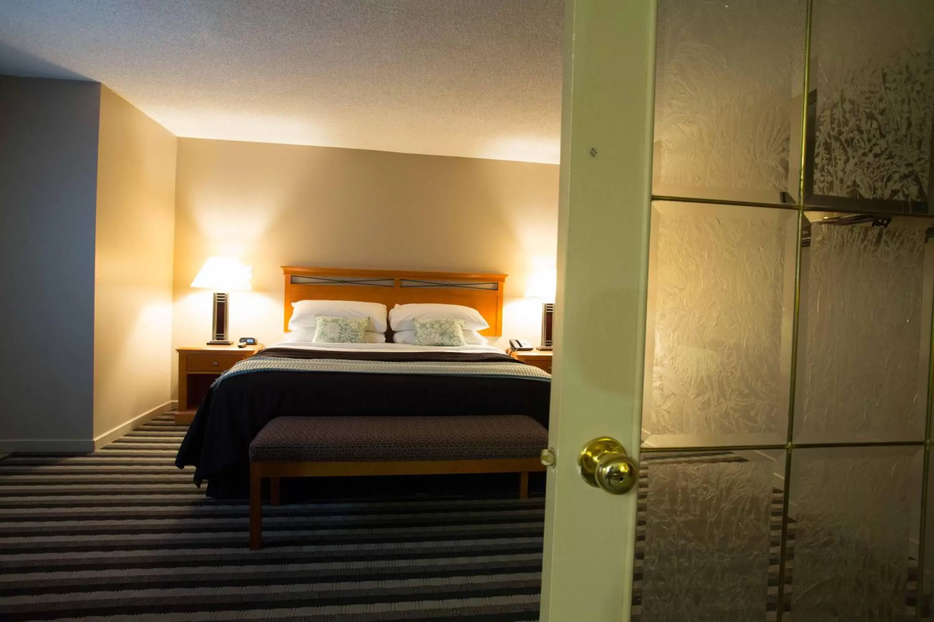 Bed in Royal Hotel West Edmonton, Trademark Collection by Wyndham Bed in Royal Hotel West Edmonton, Trademark Collection by Wyndham