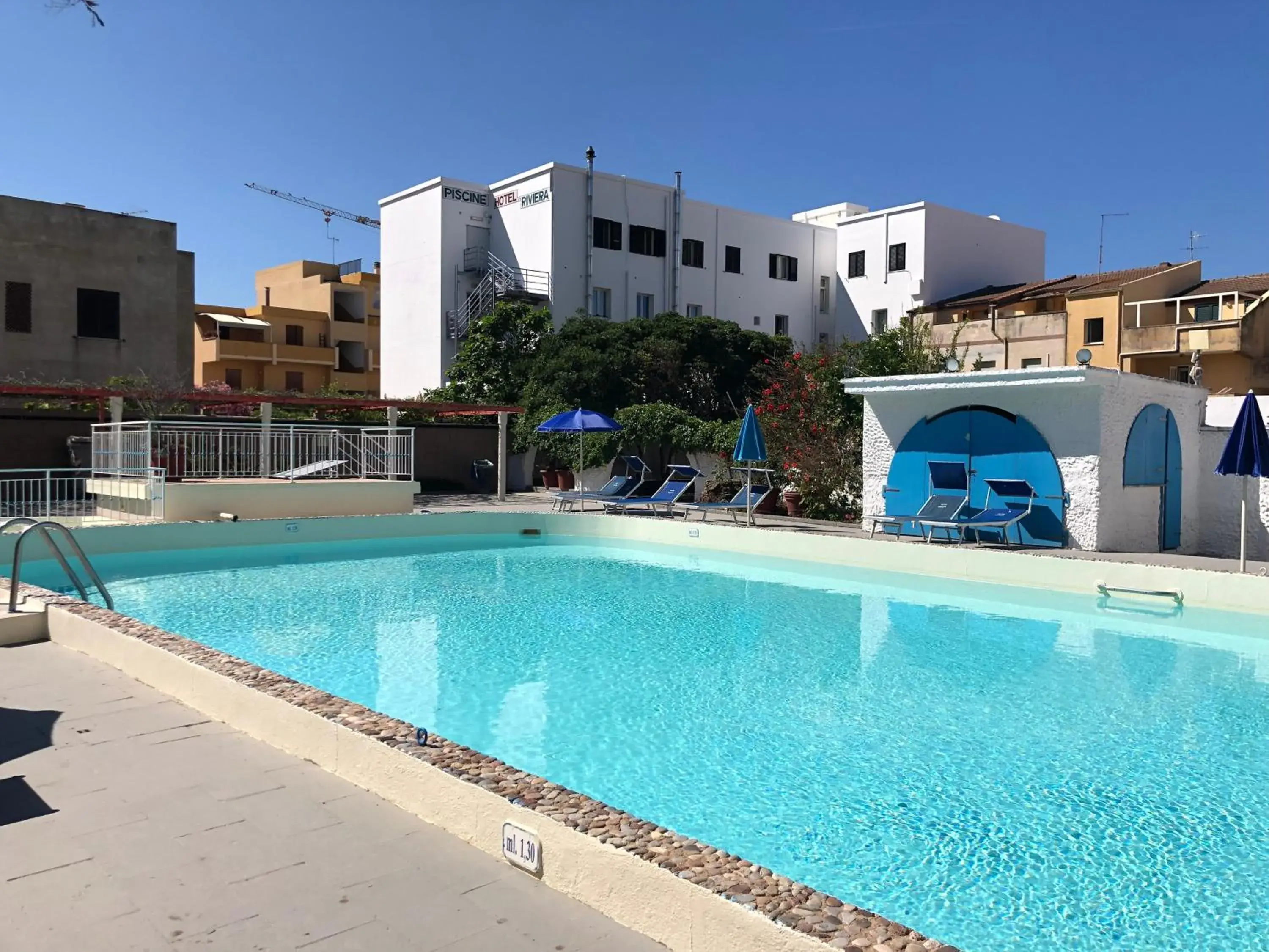 Swimming pool, Property Building in Hotel Riviera