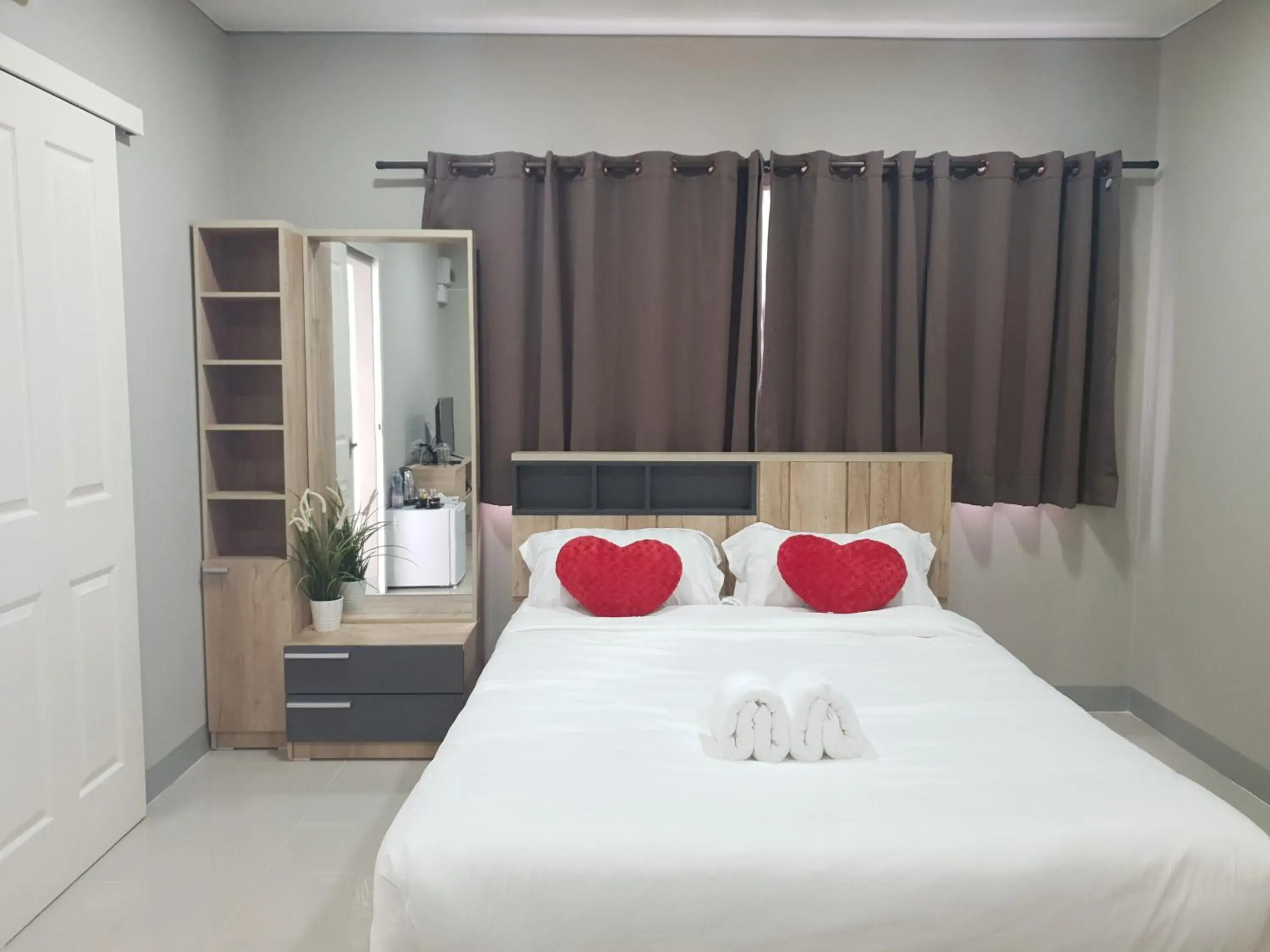 Bed in iResidence Hotel Pathumthani