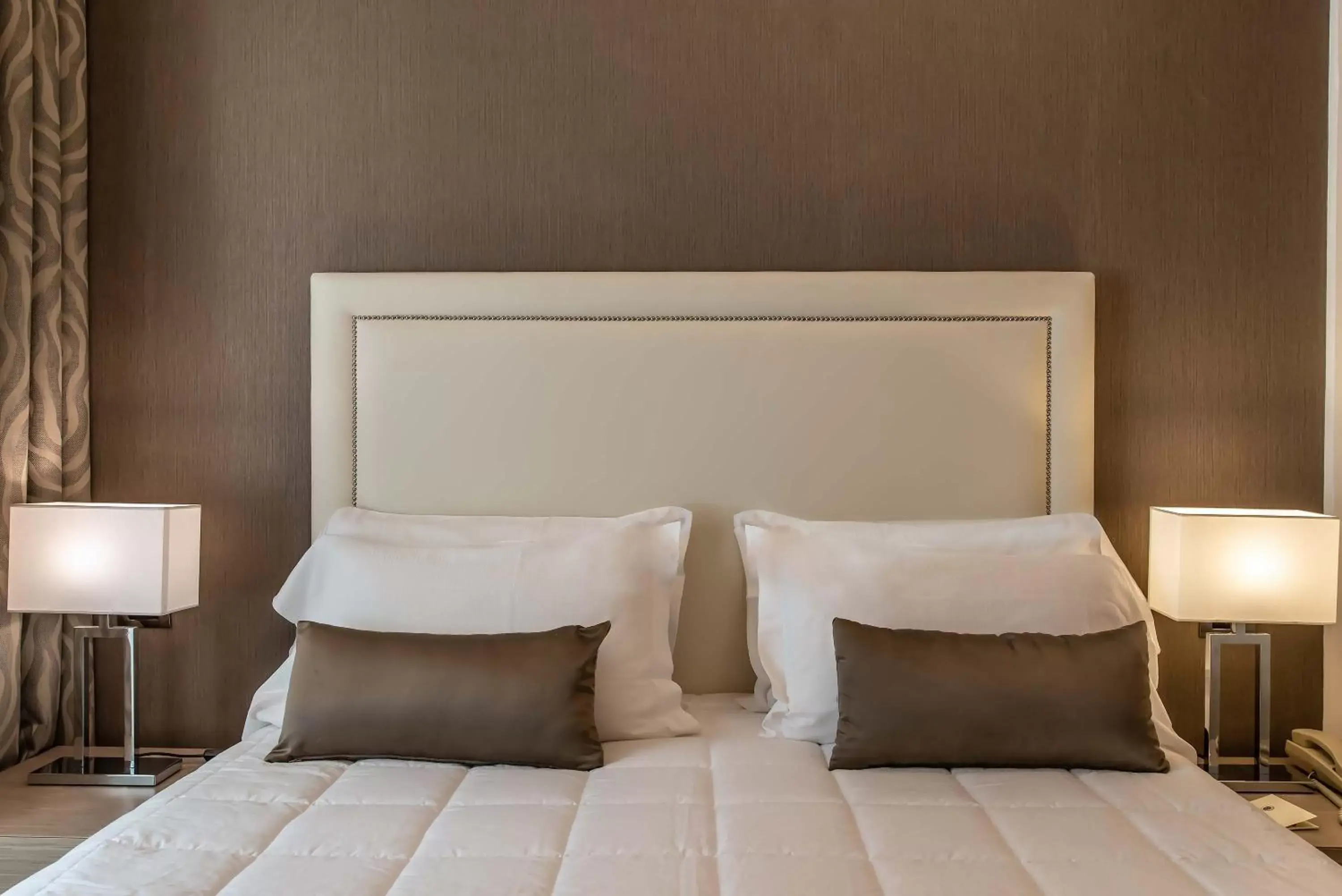Decorative detail, Bed in Hotel Genova