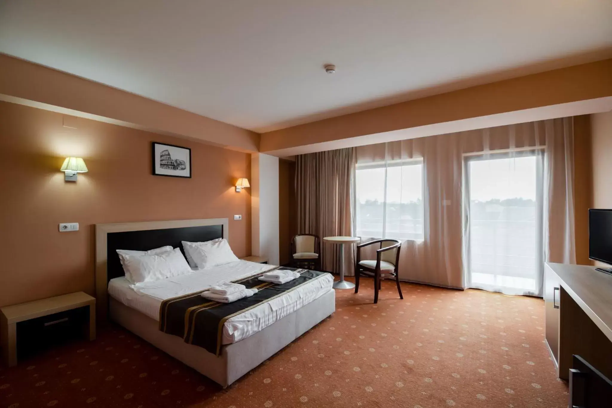 Bed in Hotel Oxford Inns&Suites