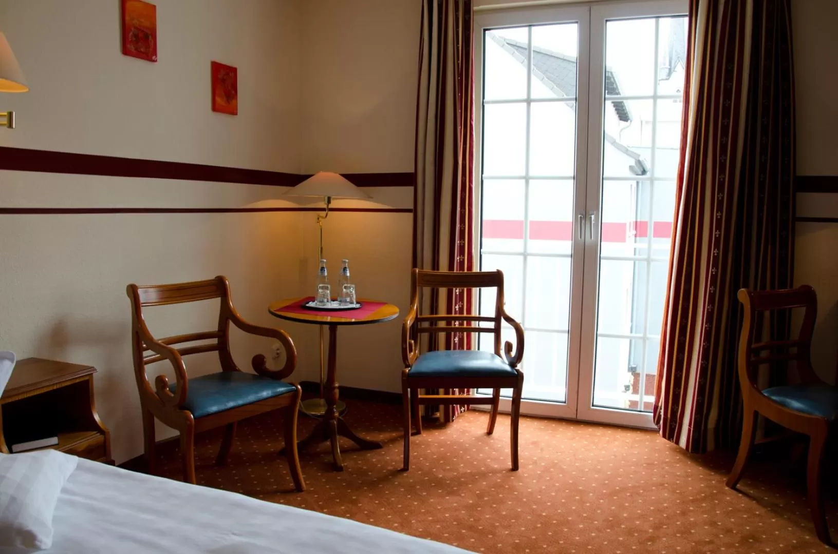 Seating area, Bed in Mercure Hotel Plaza Magdeburg