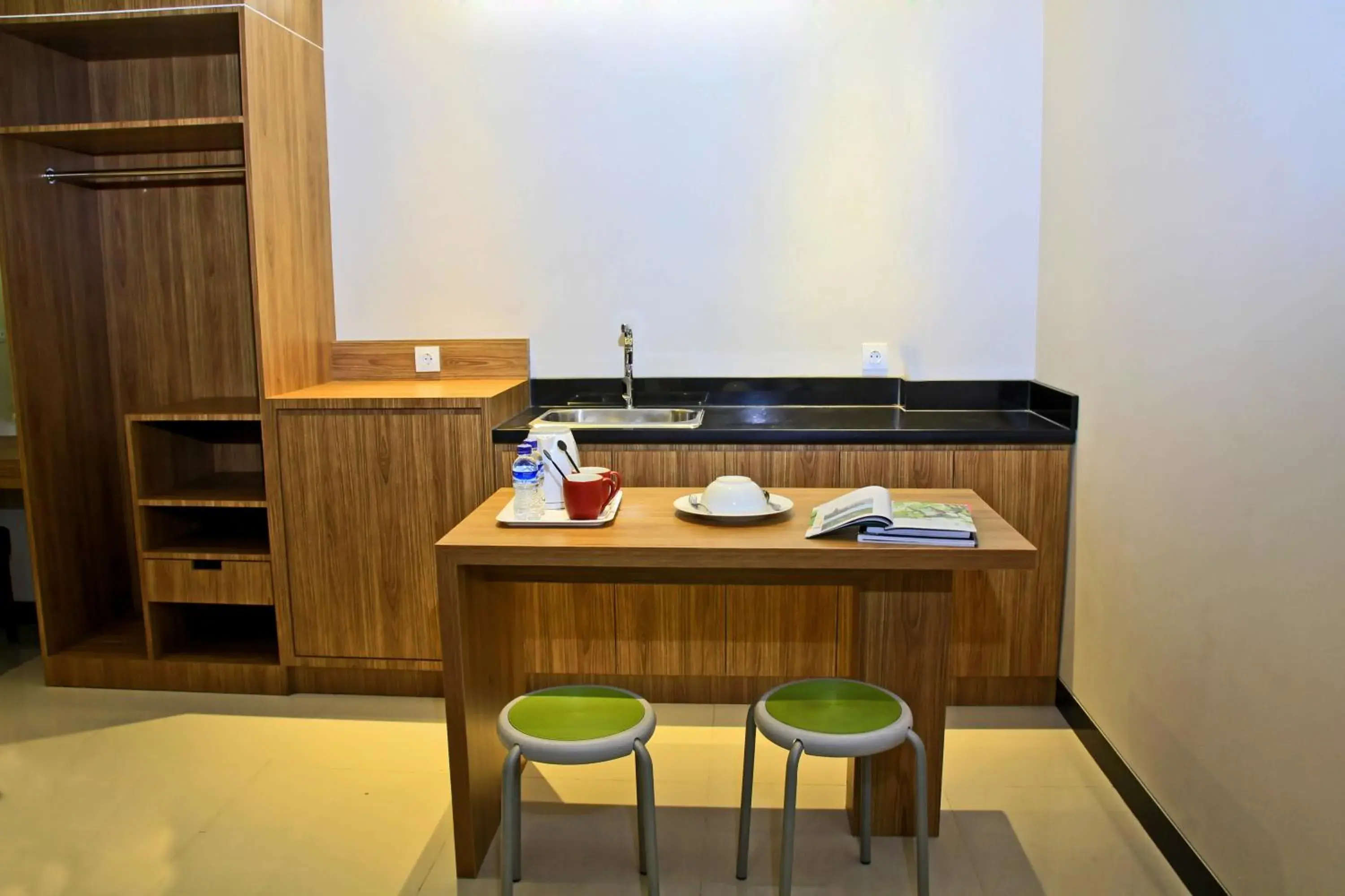 Kitchen or kitchenette in Choice Stay Hotel Denpasar