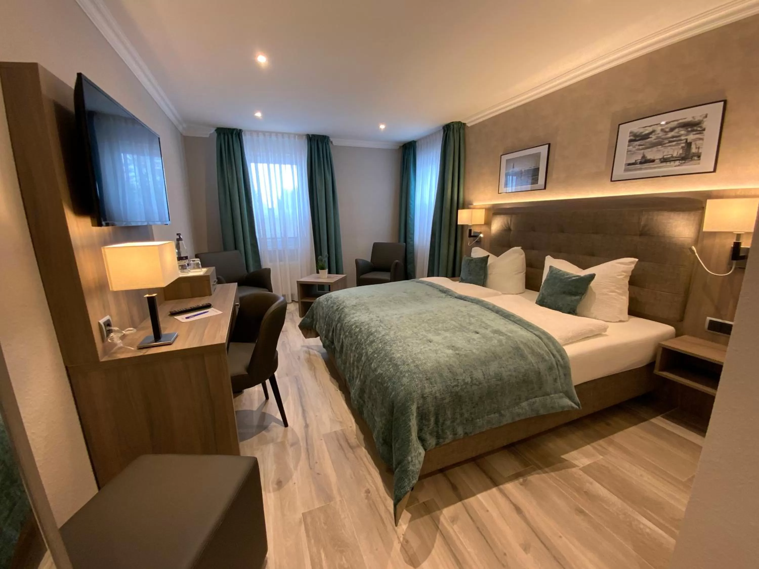 Photo of the whole room, Bed in Mertinkus Nordseehotel