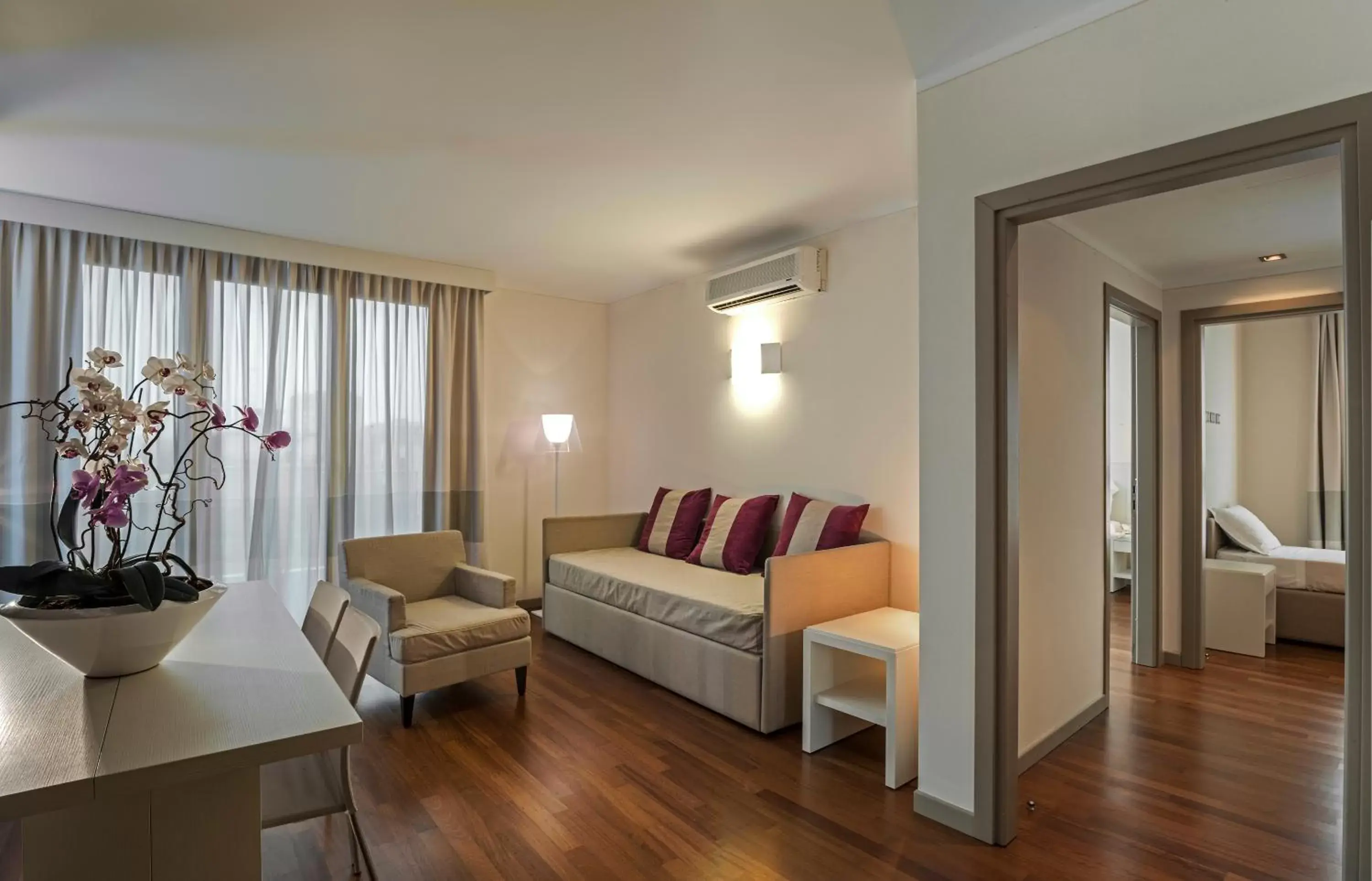 Living room, Seating Area in Ramada Plaza Milano