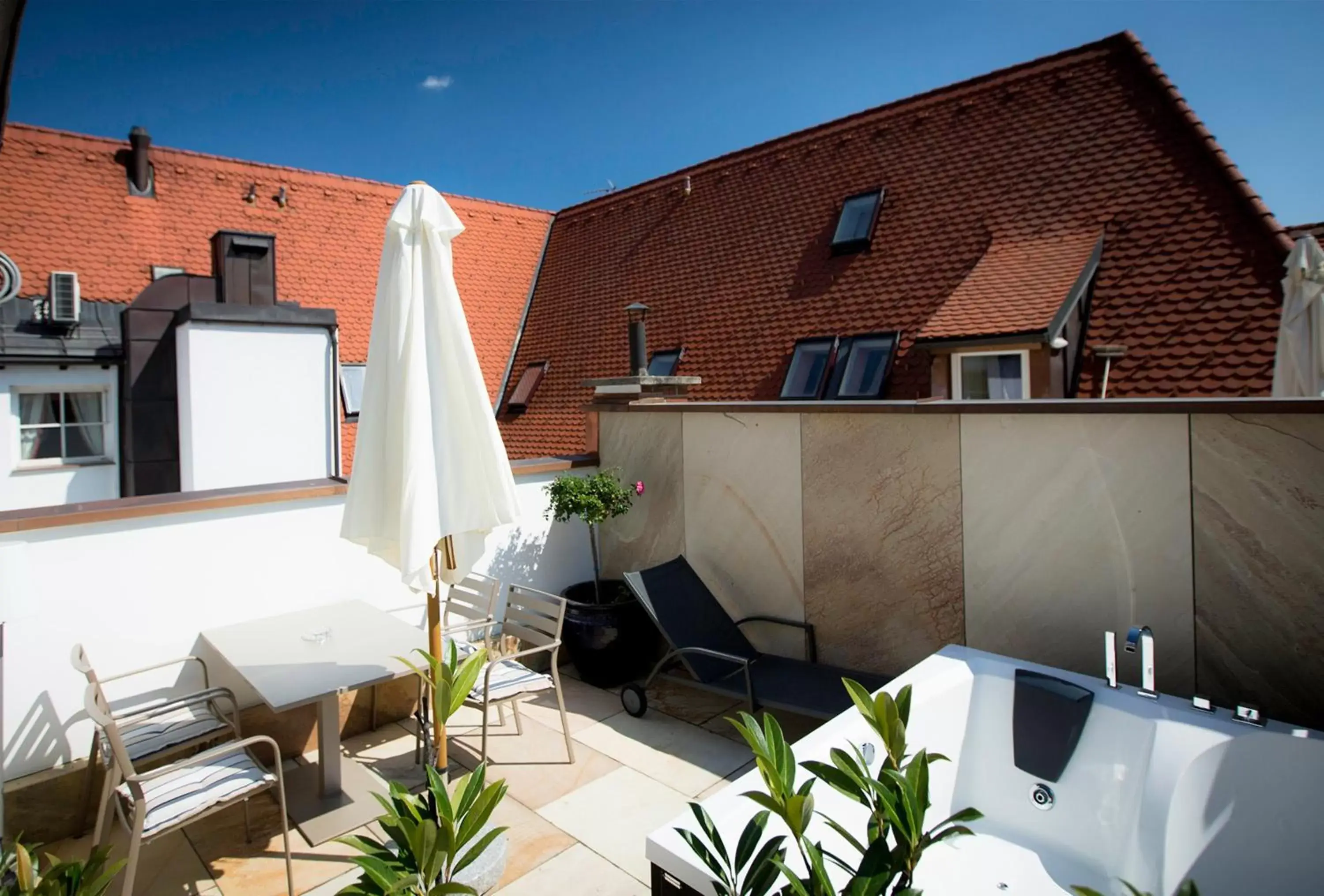 Balcony/Terrace, Property Building in BoutiqueHotel Dom - Rooms & Suites