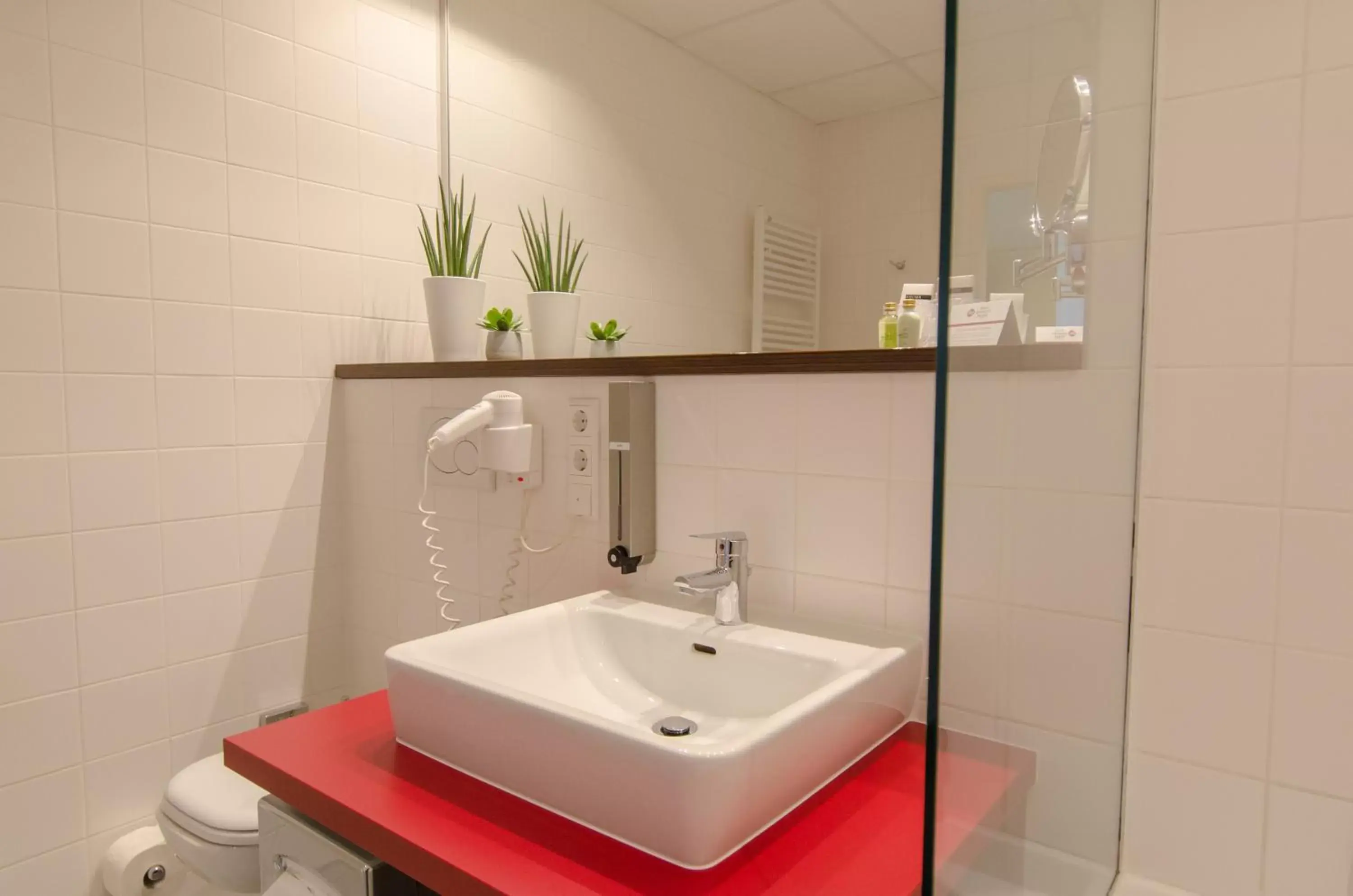 Bathroom in Best Western Plus Plaza Hotel Graz