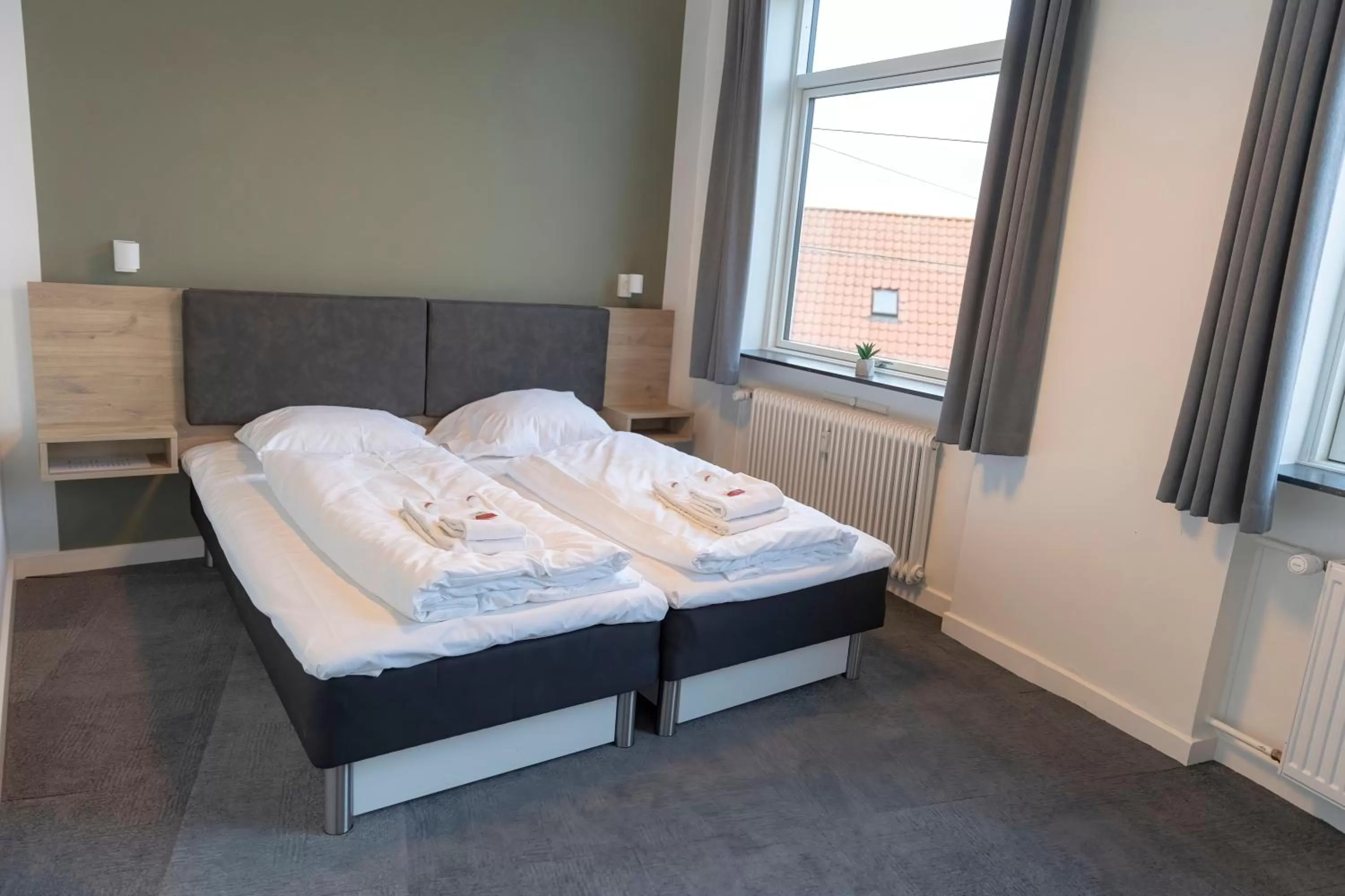 Bed in Hotel Harmonien