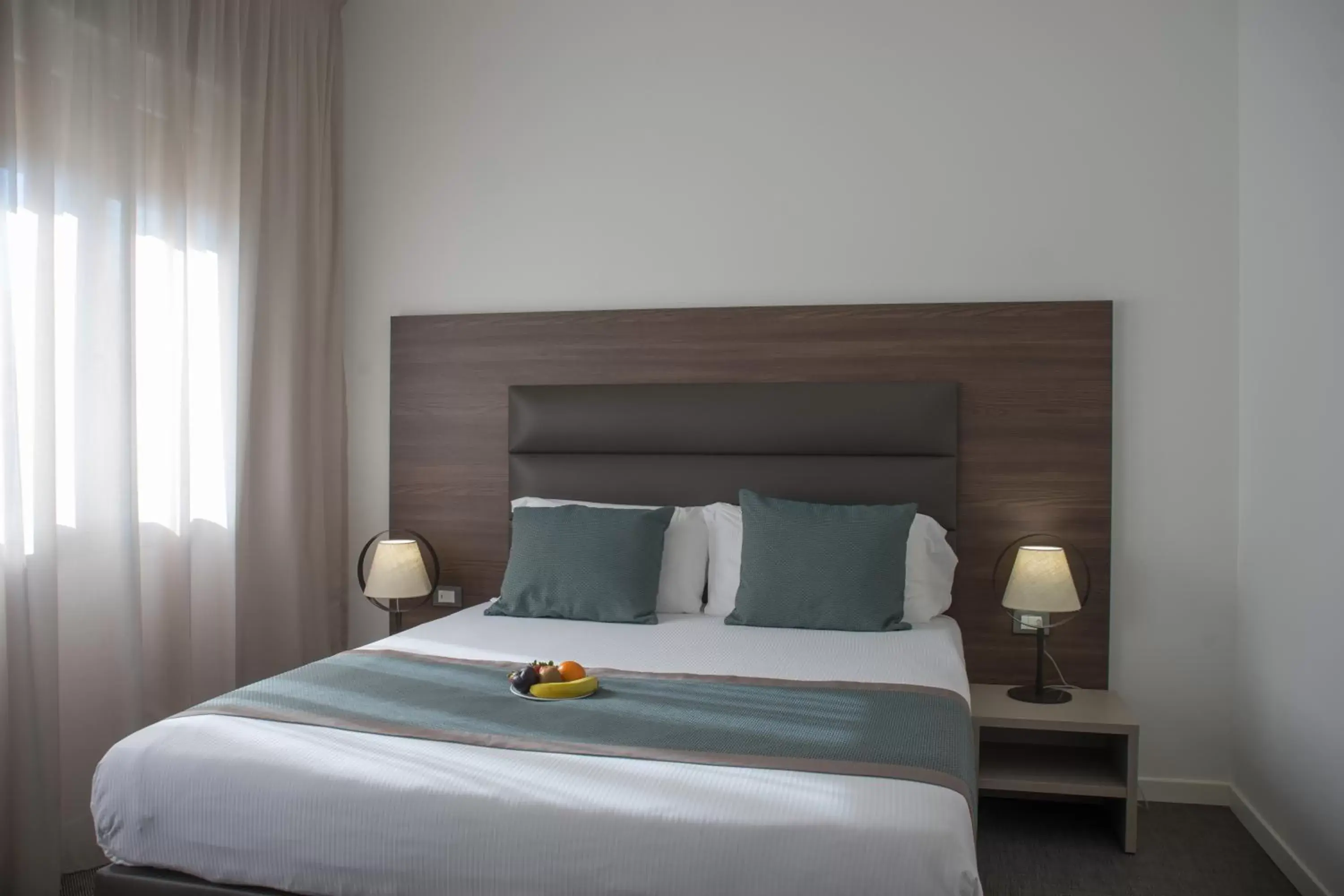 Bed in Hotel Villa Sorriso