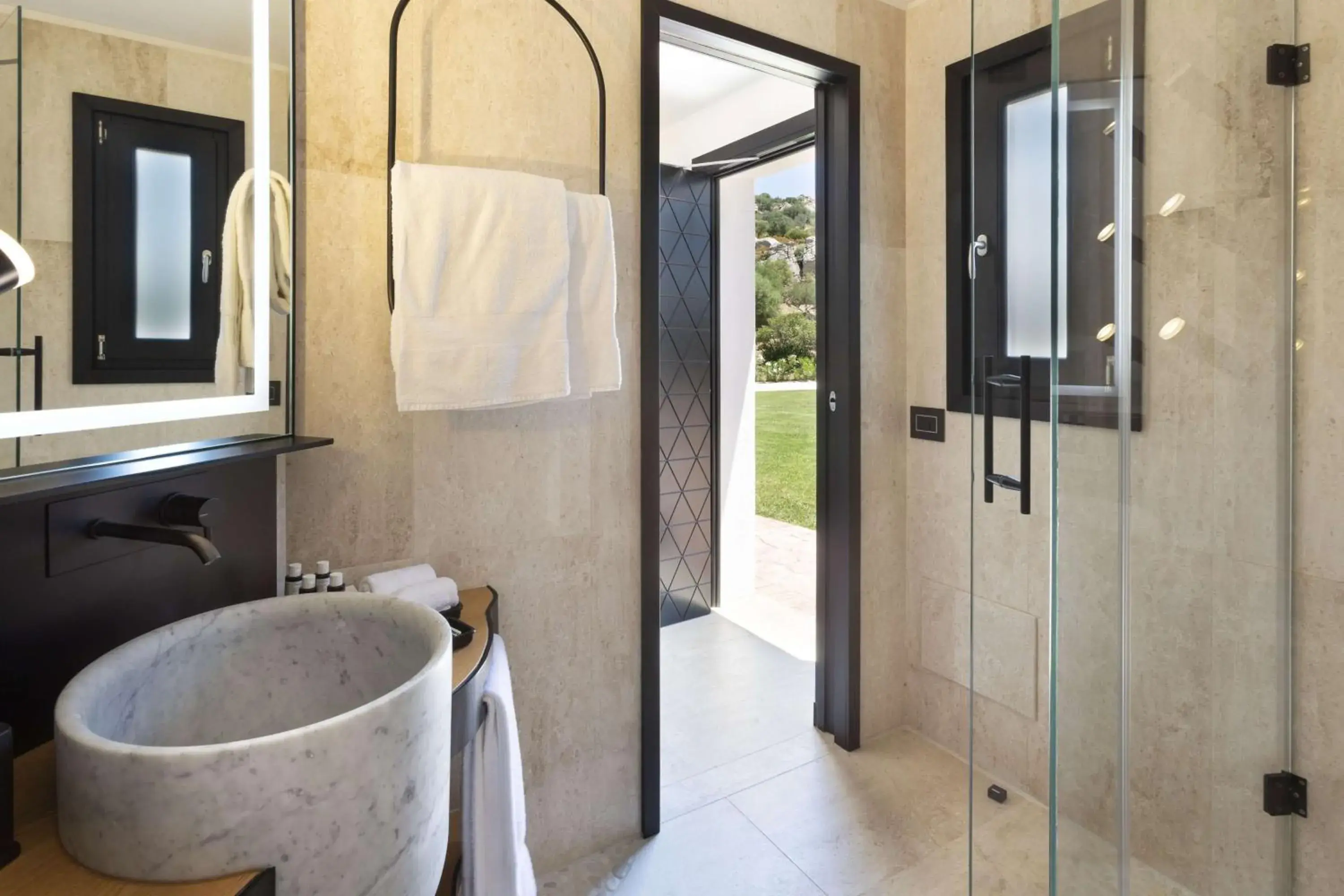 Bathroom in Sulia House Porto Rotondo, Curio Collection by Hilton