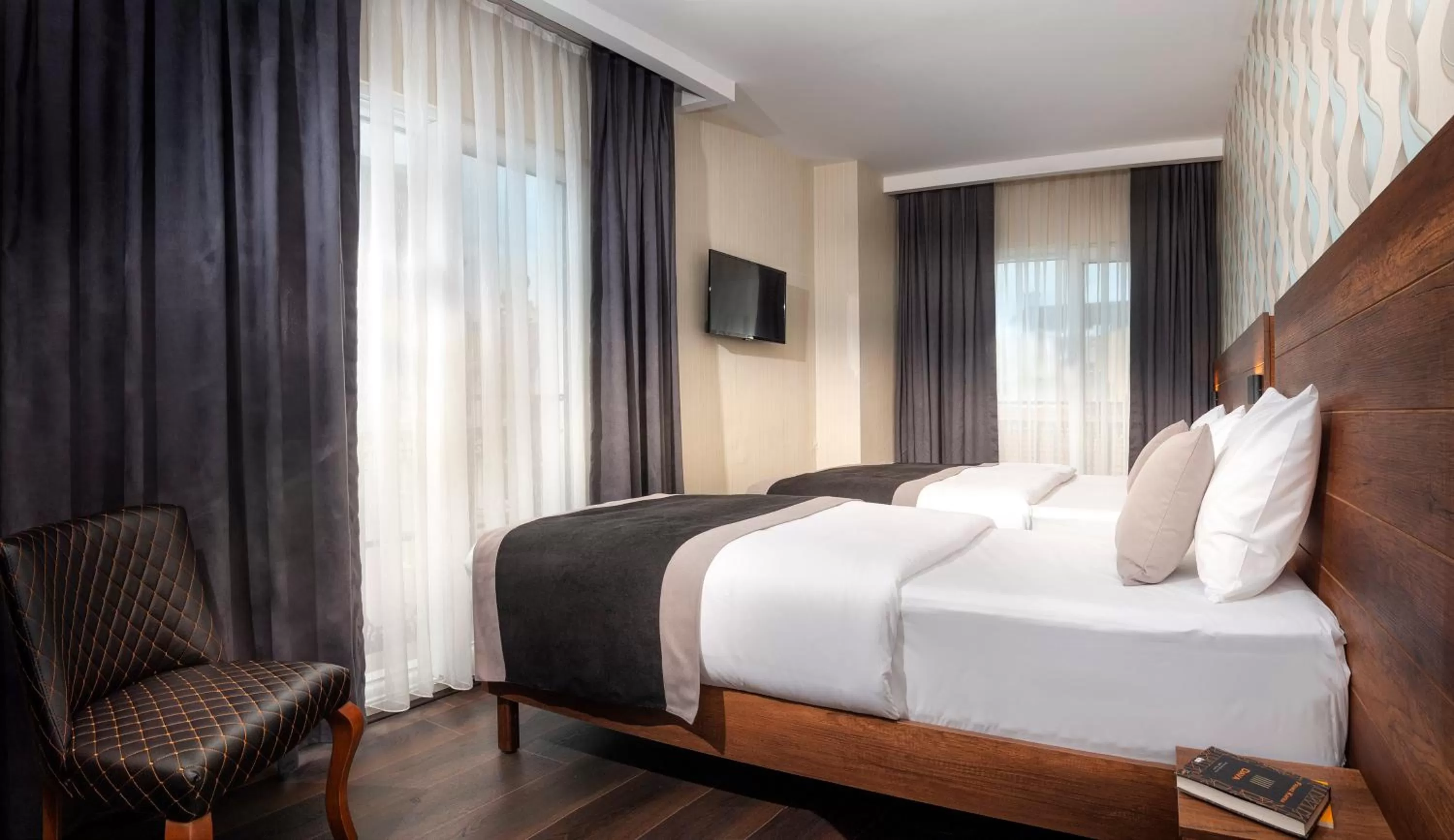 Bed in Hotel Bossuite Business