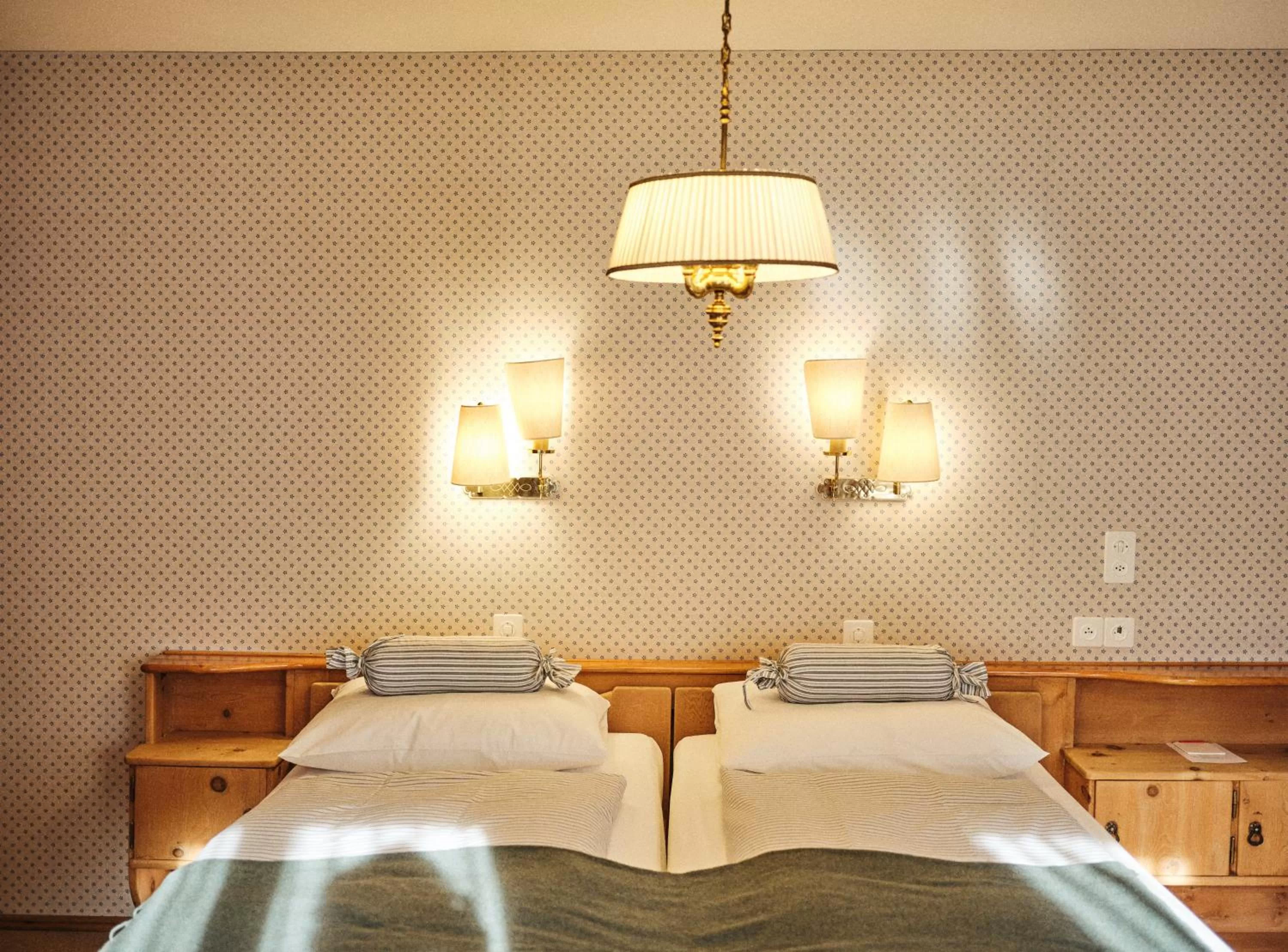 Bed in Hotel Chesa Grischuna