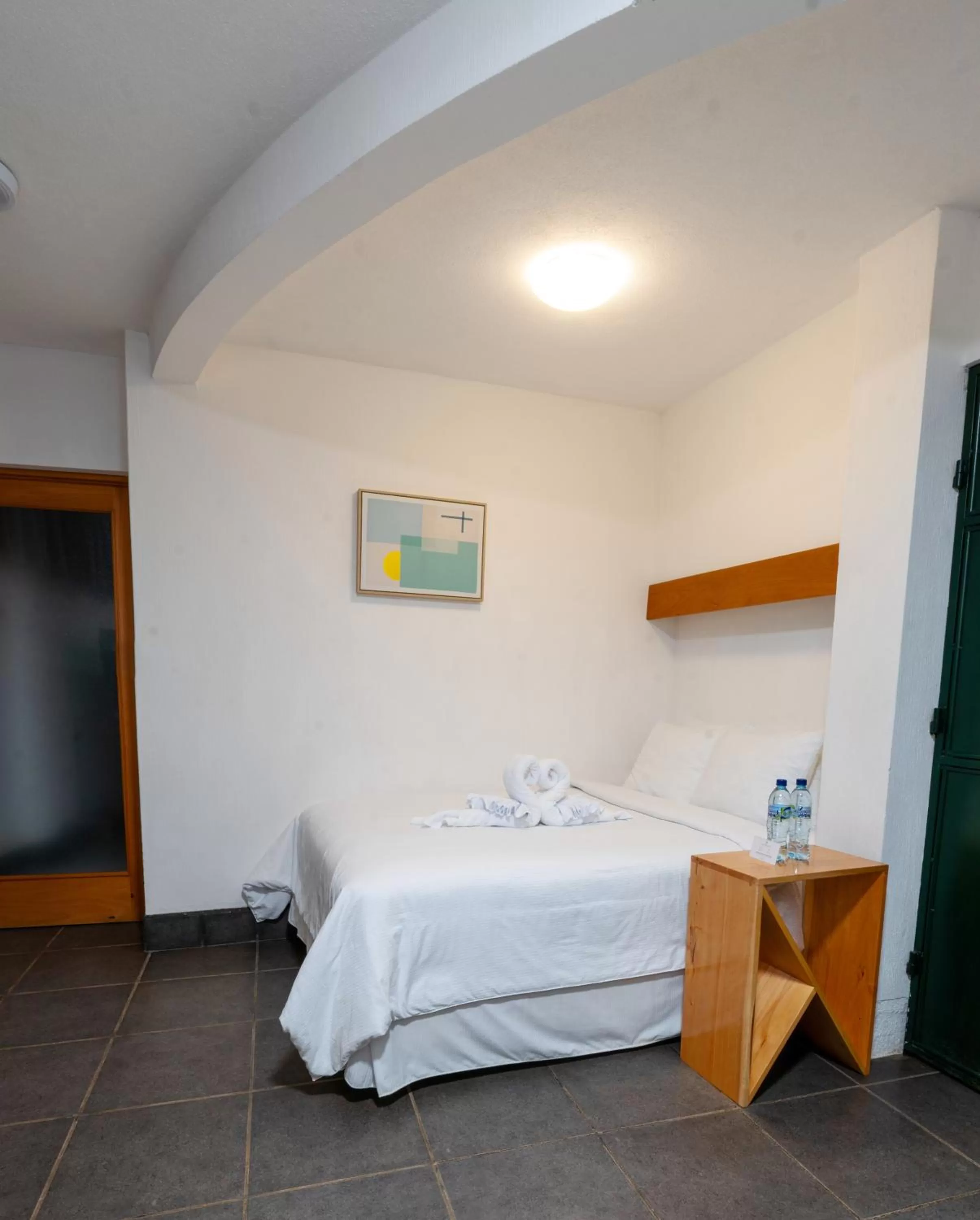 Bed in El Dragon Hotel