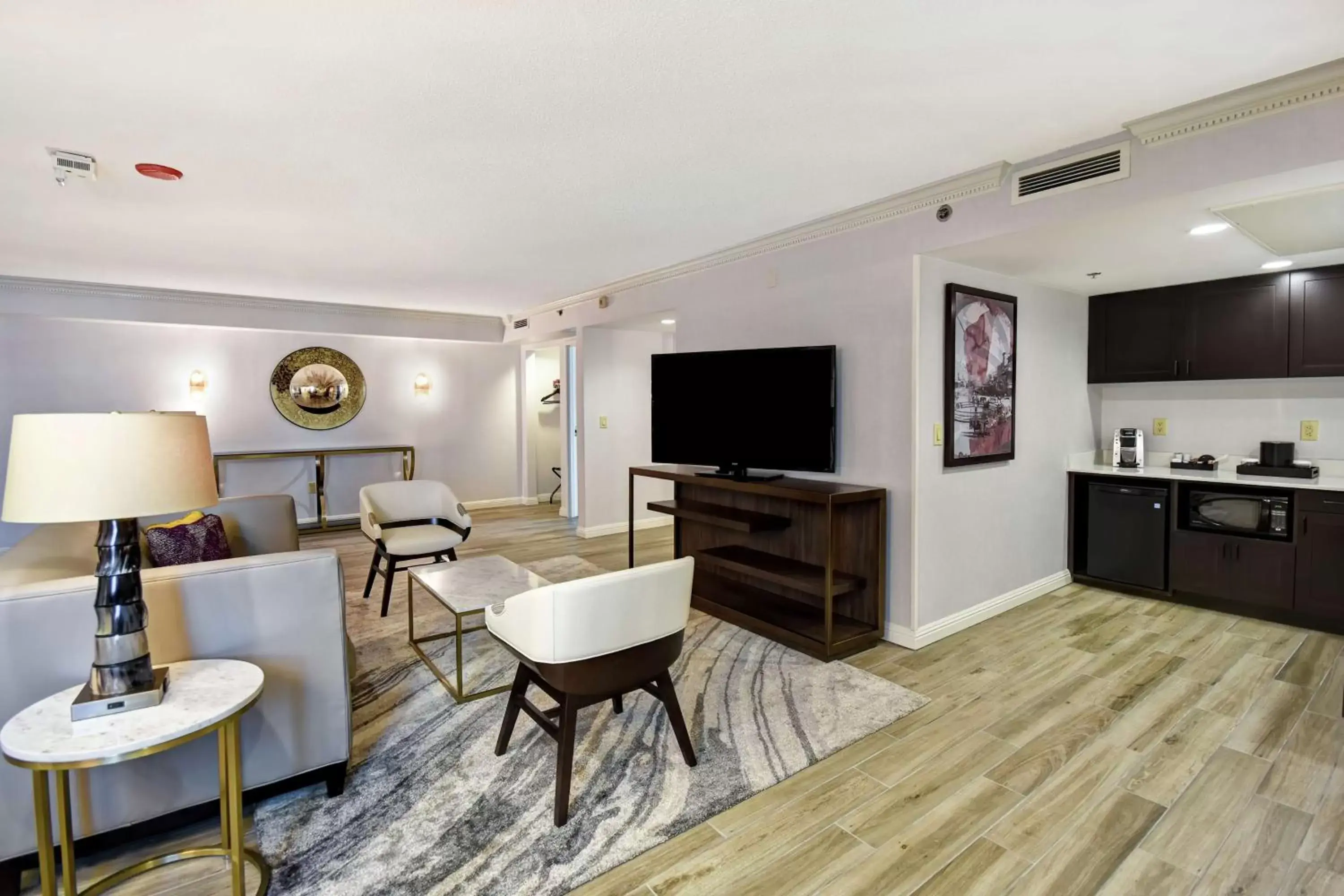 Living room in Embassy Suites Montgomery - Hotel & Conference Center Living room in Embassy Suites Montgomery - Hotel & Conference Center