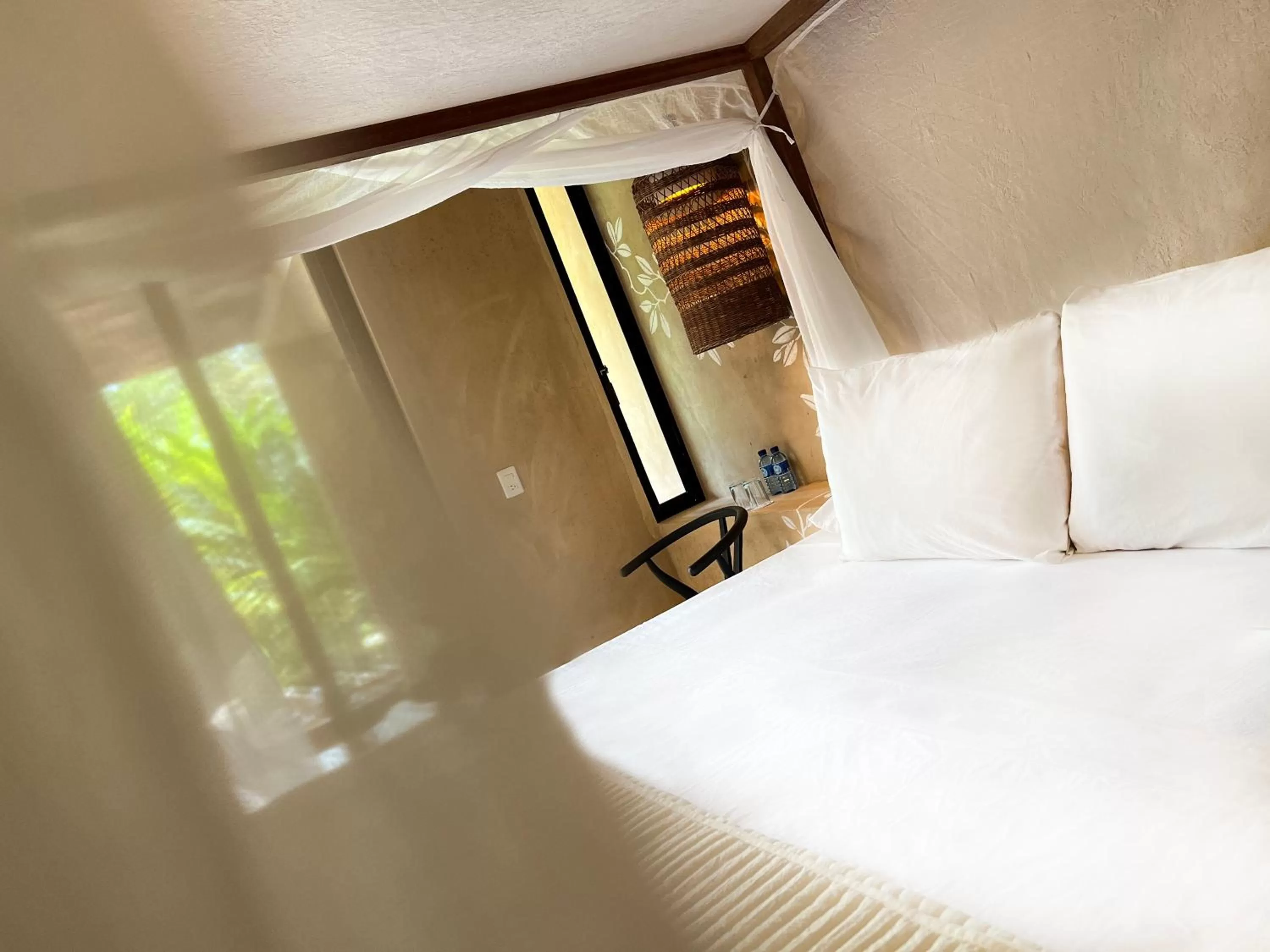 Bed in Hotel Maya Bell