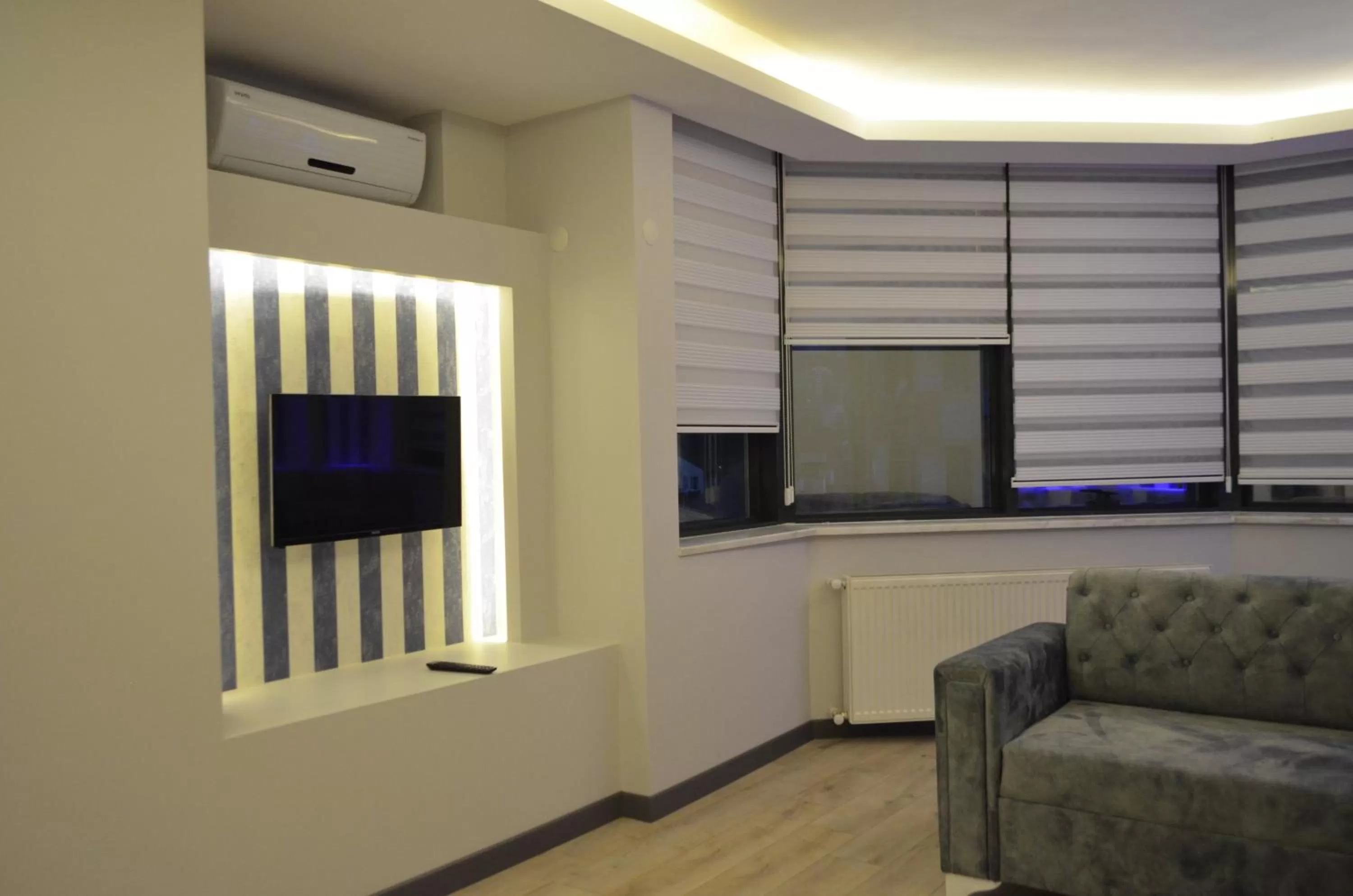TV and multimedia, TV/Entertainment Center in Yılmaz Suit Apartments